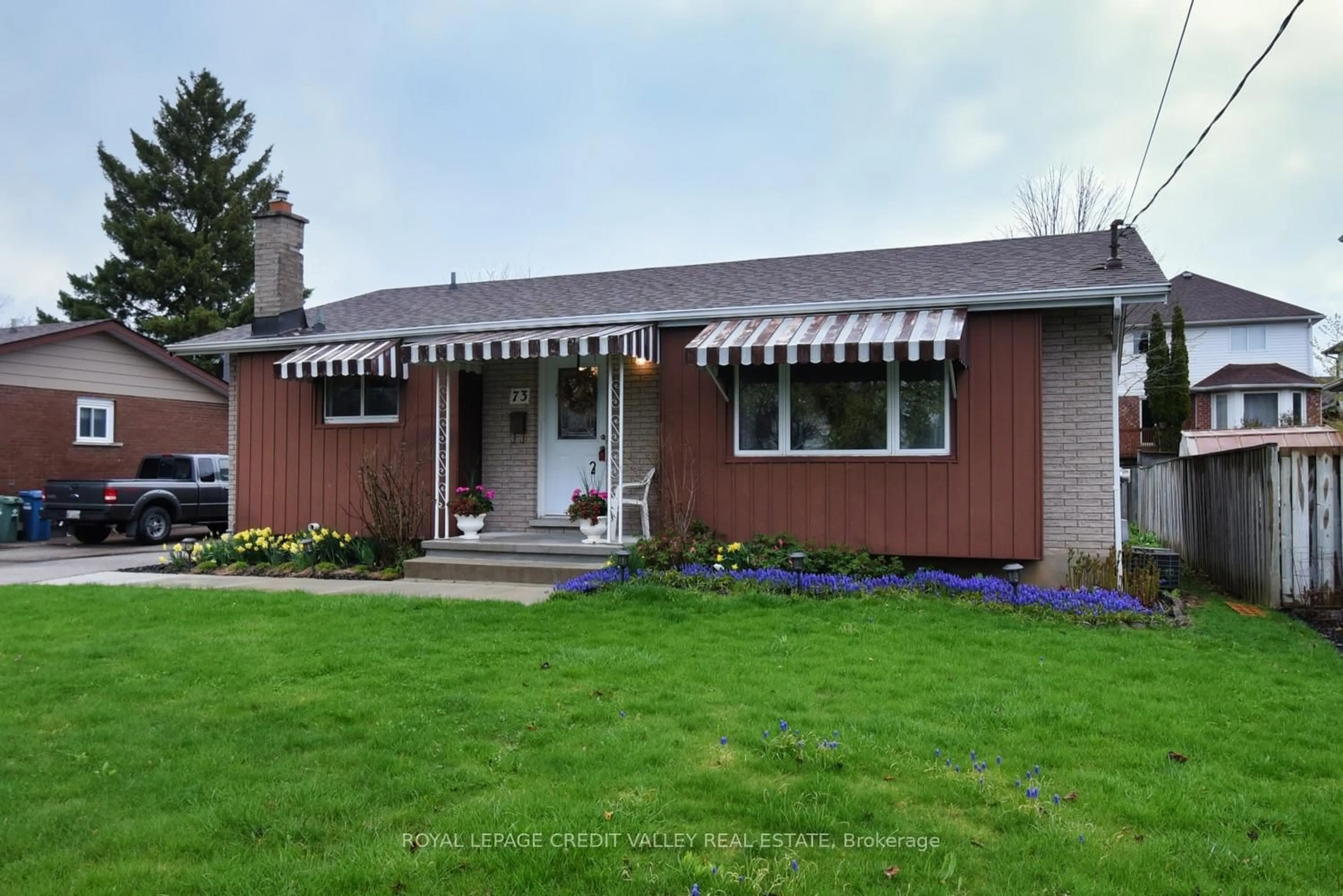 Home with vinyl exterior material, street for 73 Cheltonwood Ave, Guelph Ontario N1E 4E4