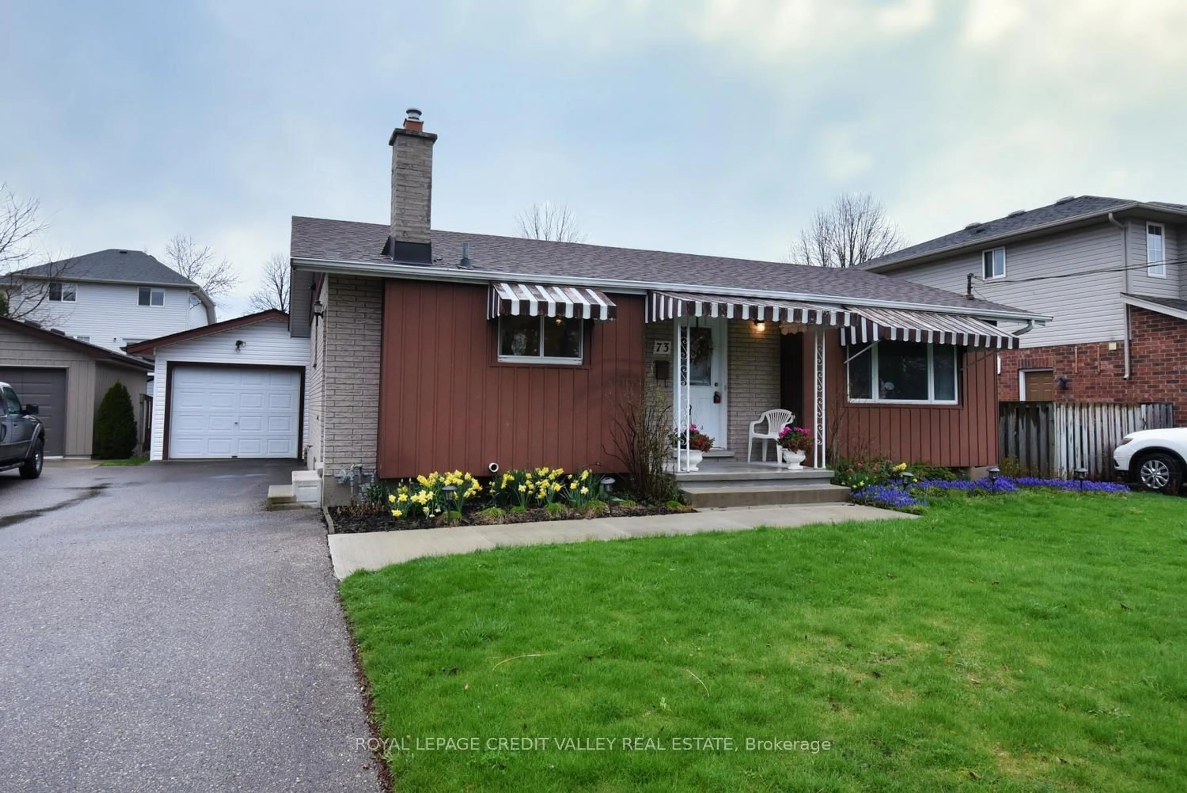 Home with vinyl exterior material, street for 73 Cheltonwood Ave, Guelph Ontario N1E 4E4