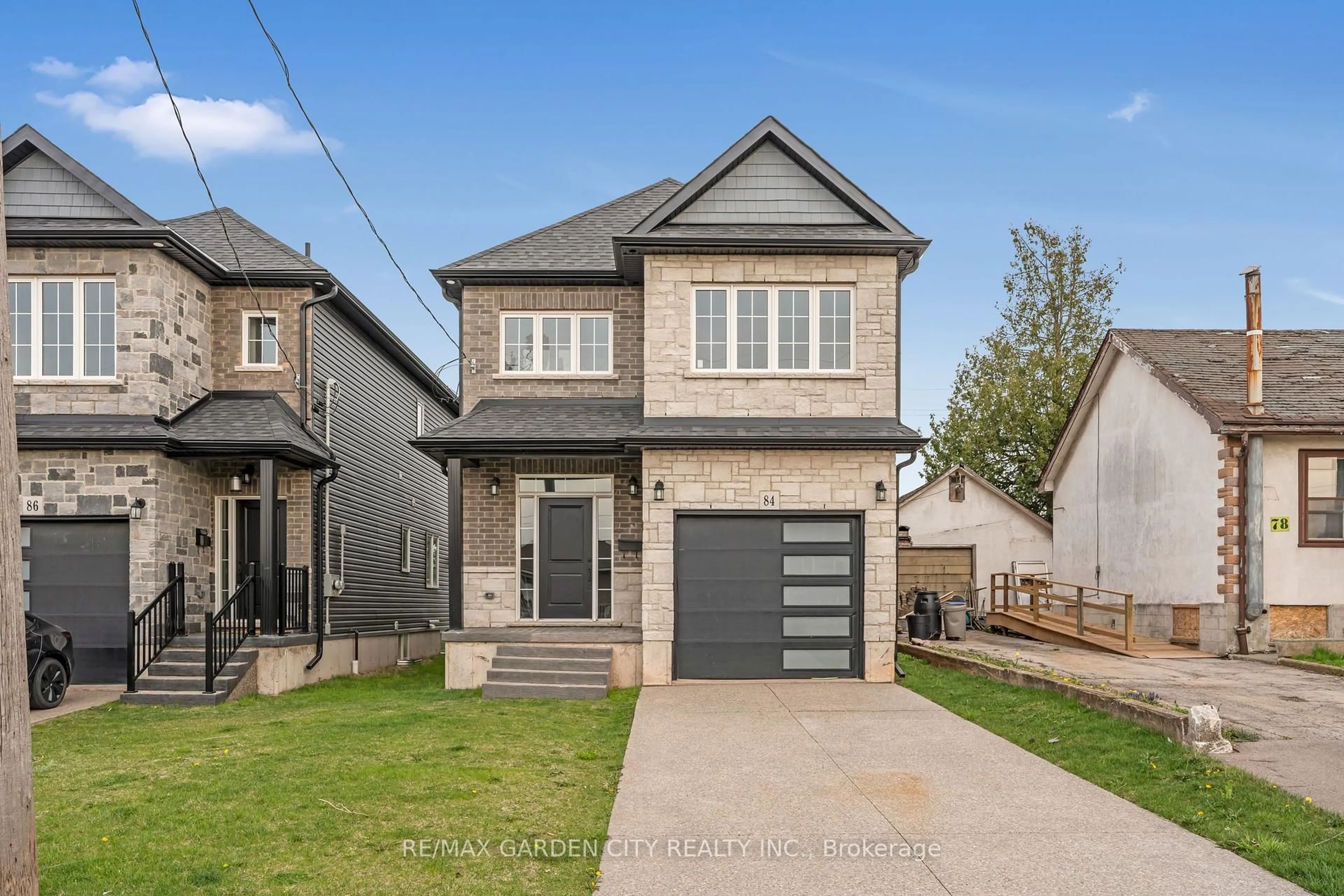 Home with brick exterior material, street for 84 Beland Ave, Hamilton Ontario L8H 6C1
