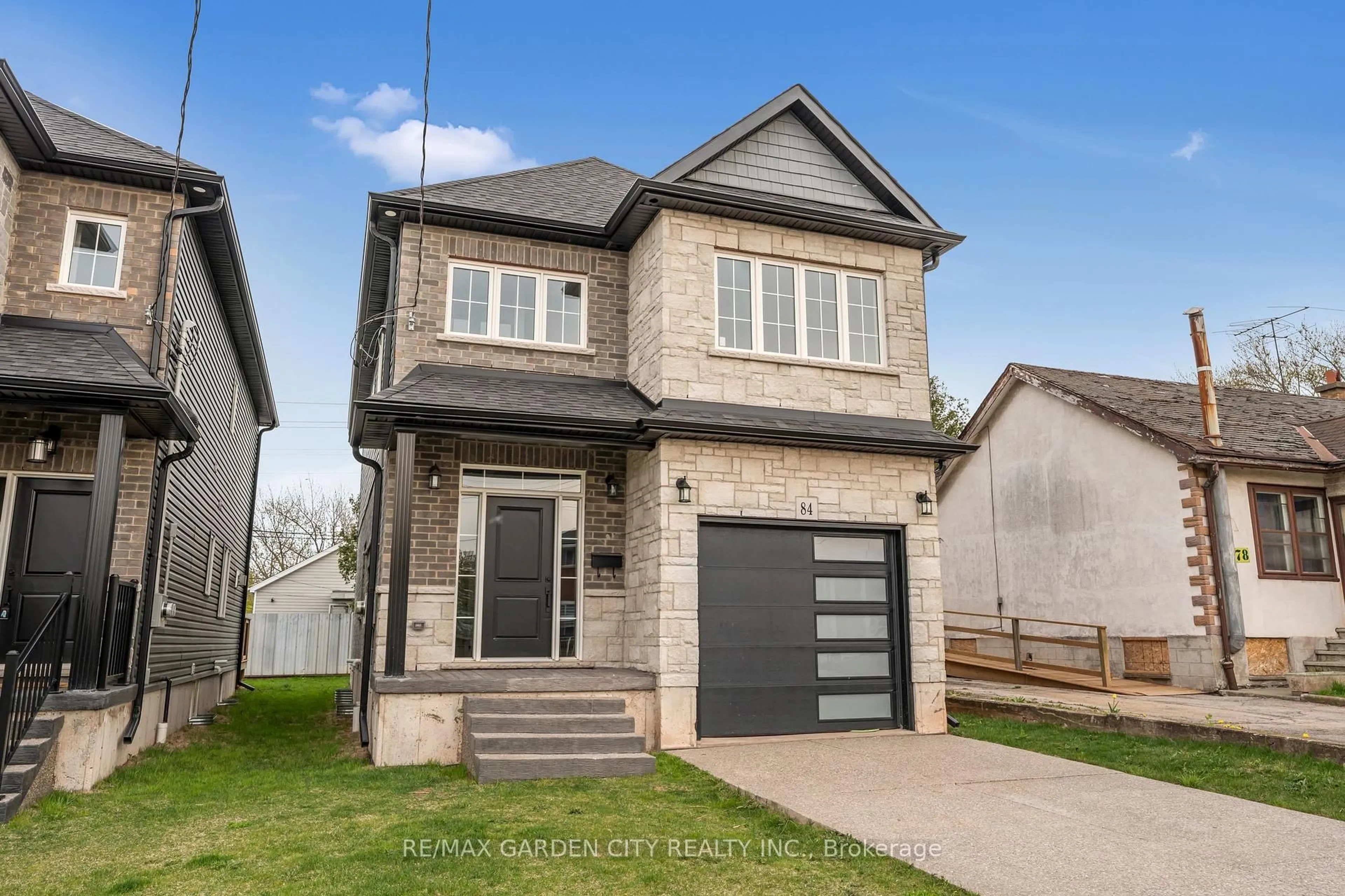 Home with brick exterior material, street for 84 Beland Ave, Hamilton Ontario L8H 6C1