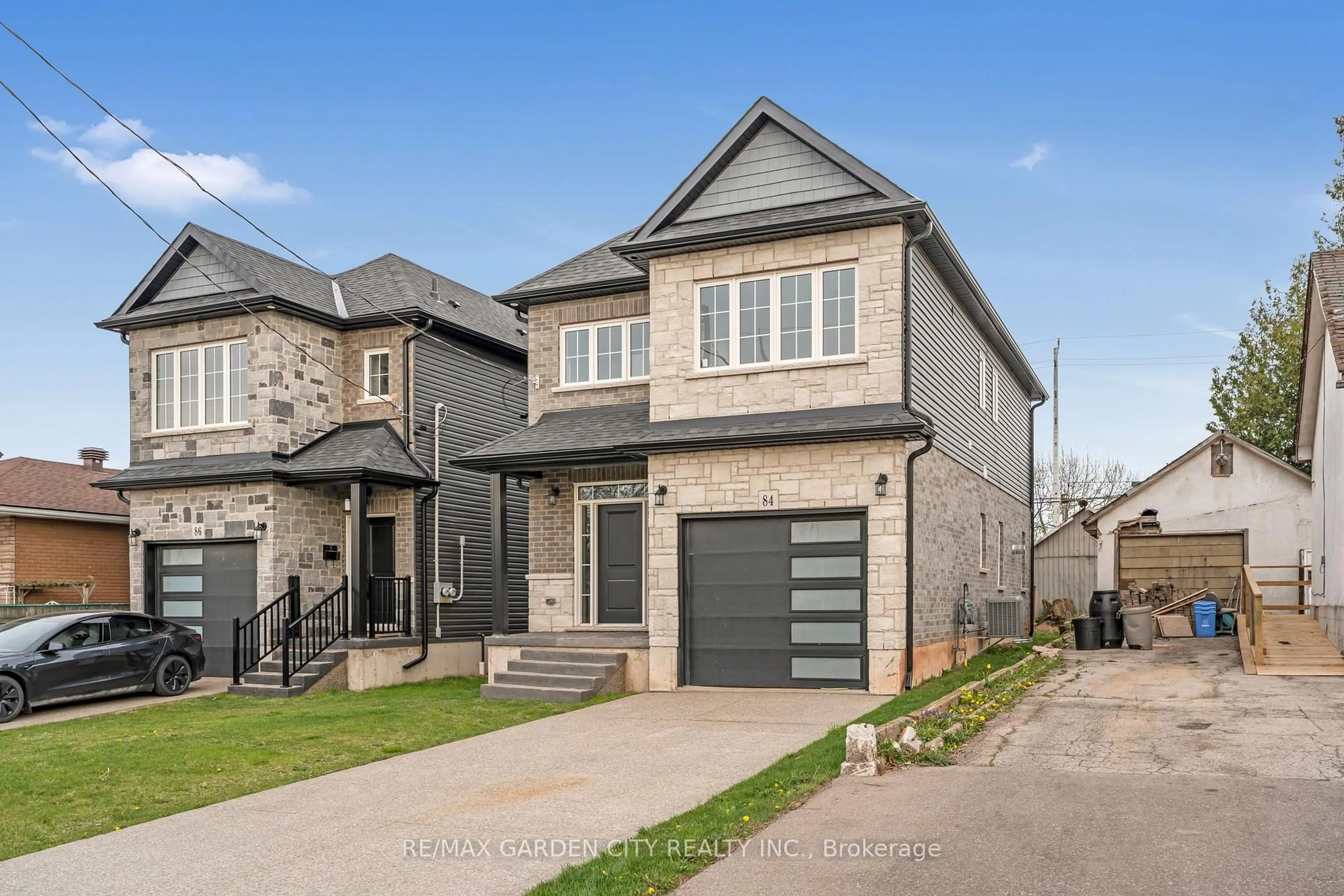 Home with brick exterior material, street for 84 Beland Ave, Hamilton Ontario L8H 6C1
