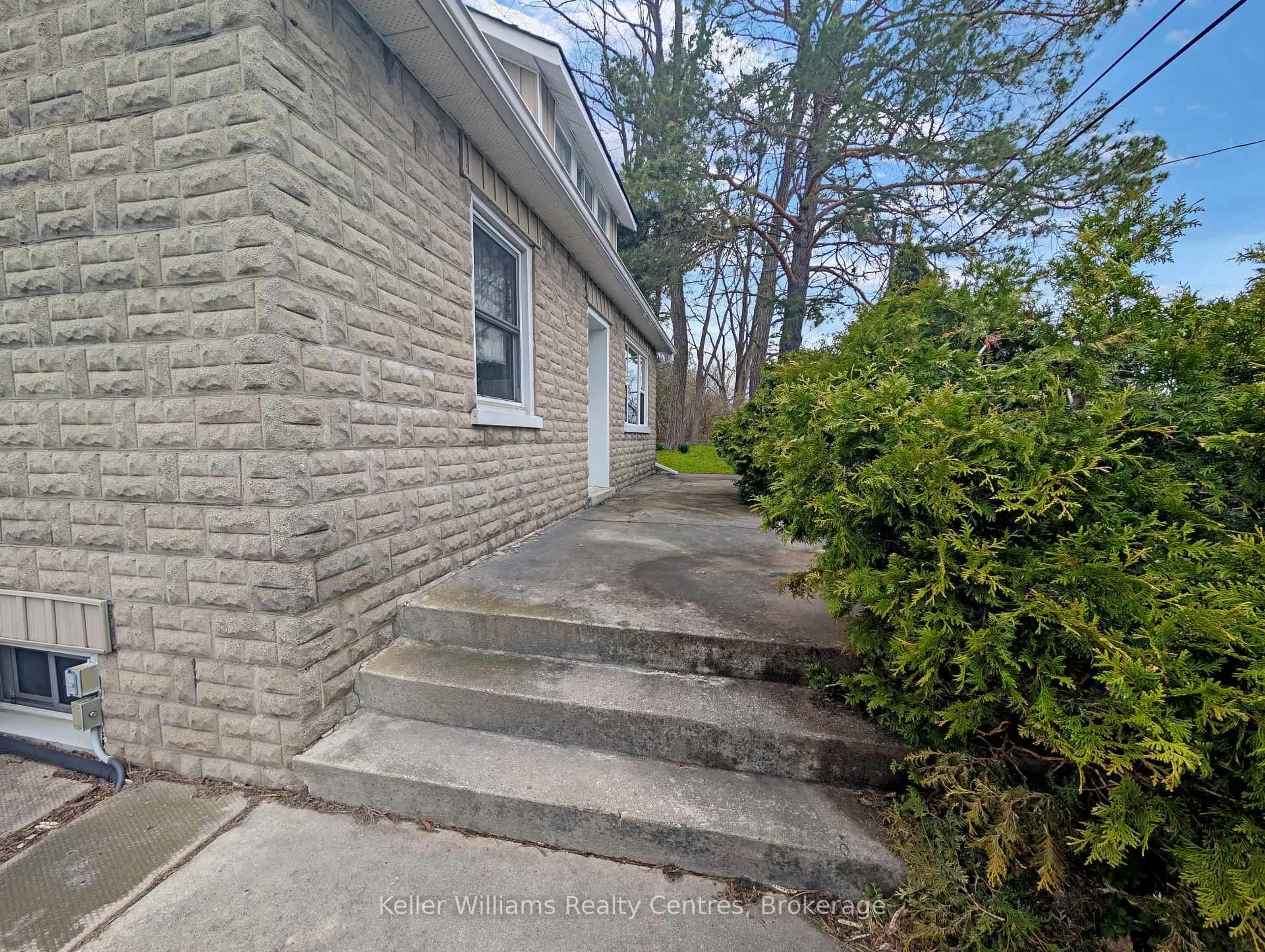 A pic from outside/outdoor area/front of a property/back of a property/a pic from drone, street for 313238 Highway 6 Highway, West Grey Ontario N0G 1R0