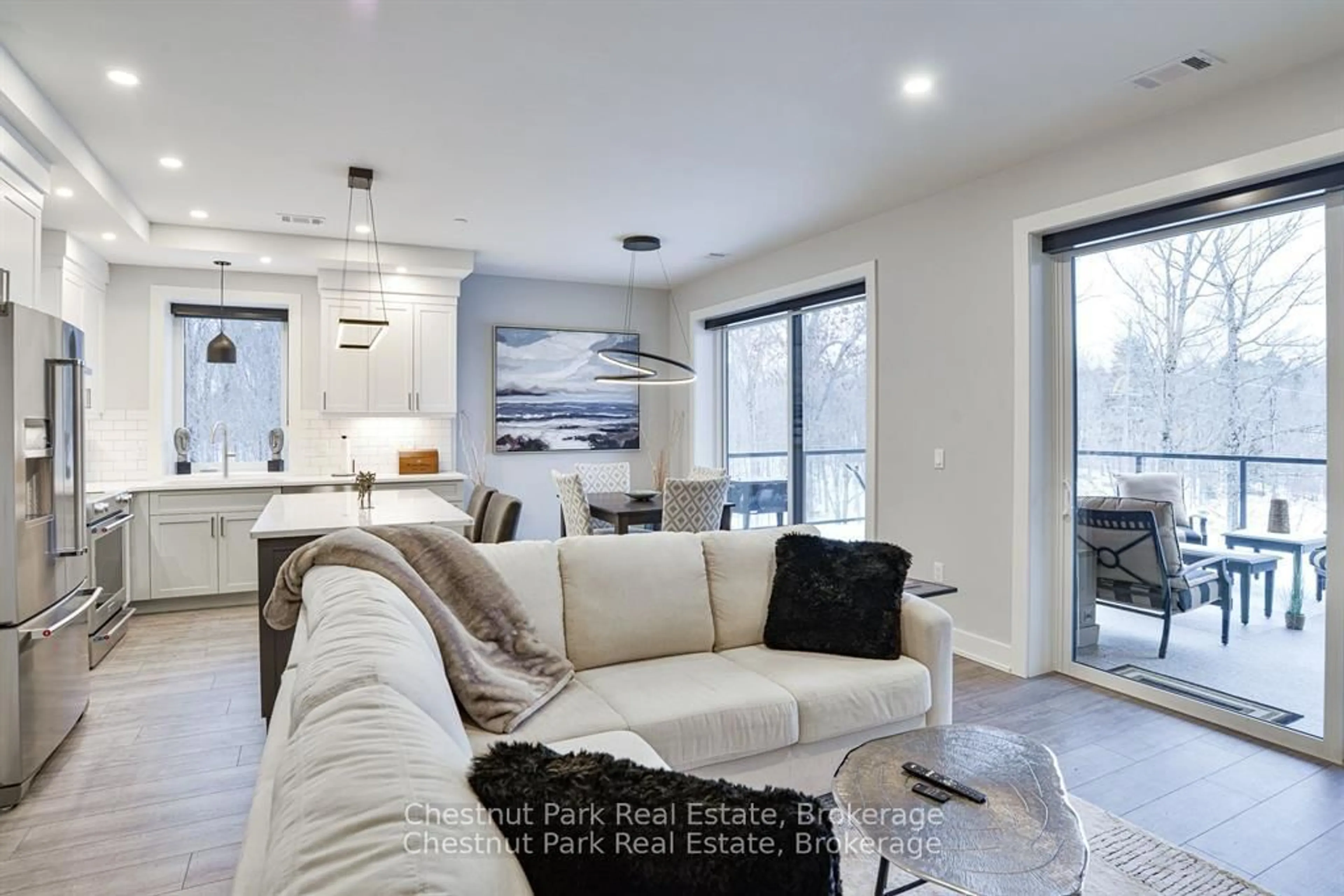 Living room with furniture, unknown for 18 Campus Tr #404, Huntsville Ontario P1H 0K2