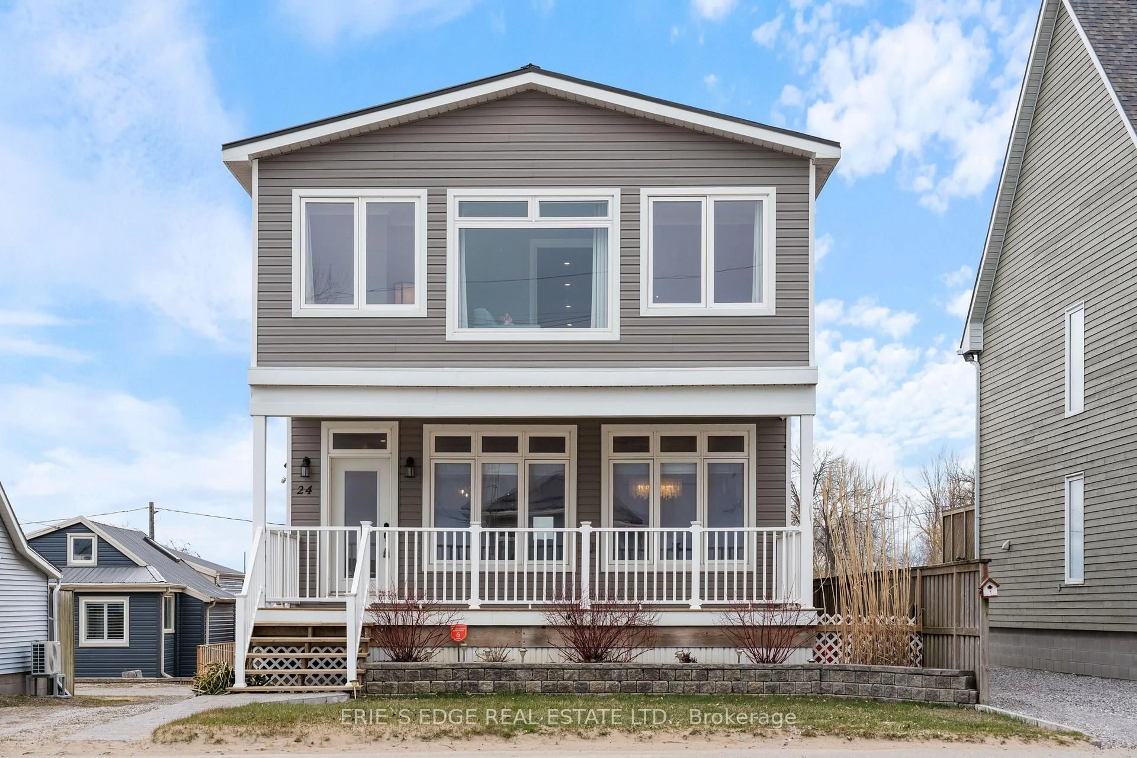 Home with vinyl exterior material, street for 24 Erie Blvd, Norfolk Ontario N0E 1M0