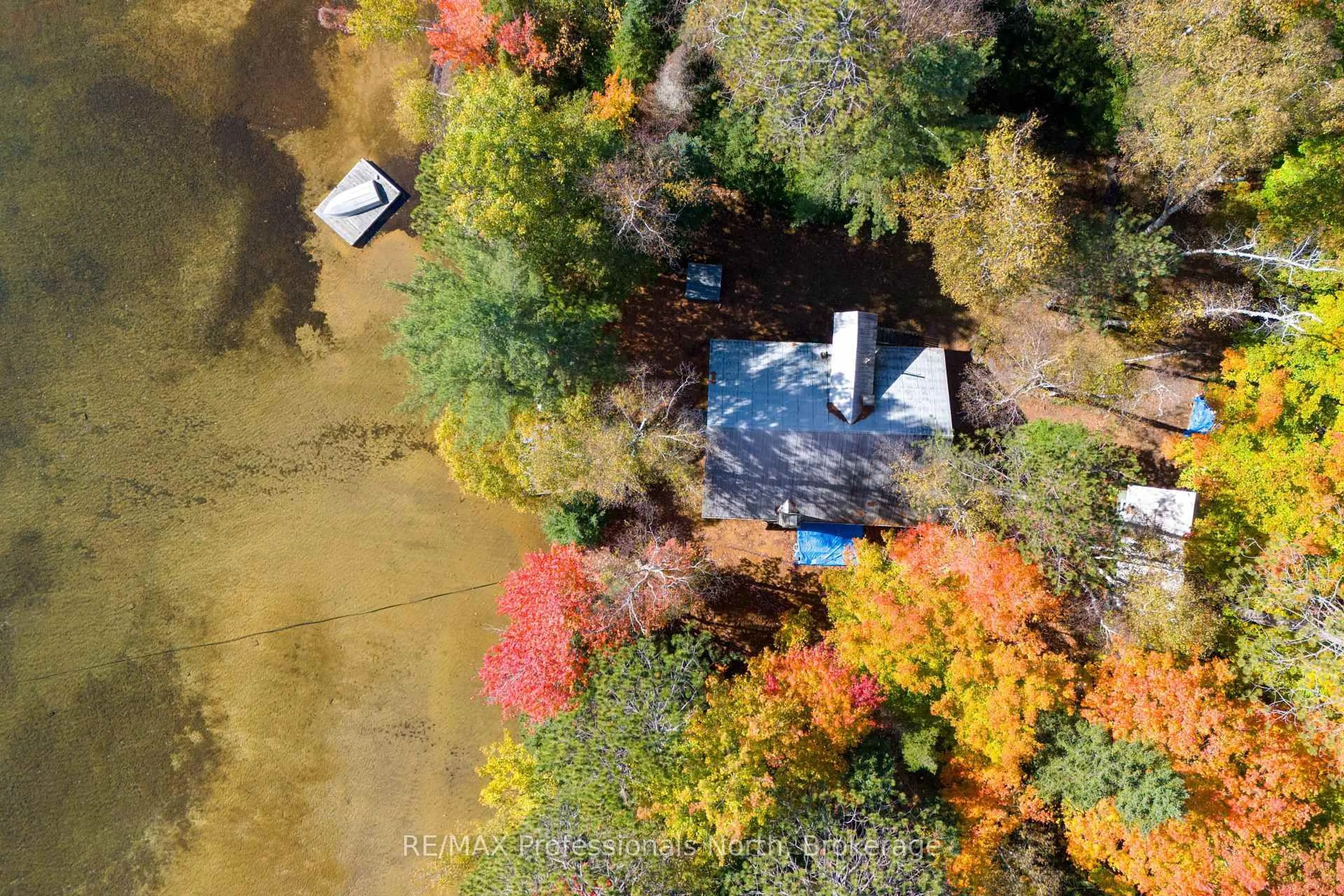 A pic from outside/outdoor area/front of a property/back of a property/a pic from drone, water/lake/river/ocean view for 1411 Billie Bear Rd #3, Lake of Bays Ontario P1H 2J6