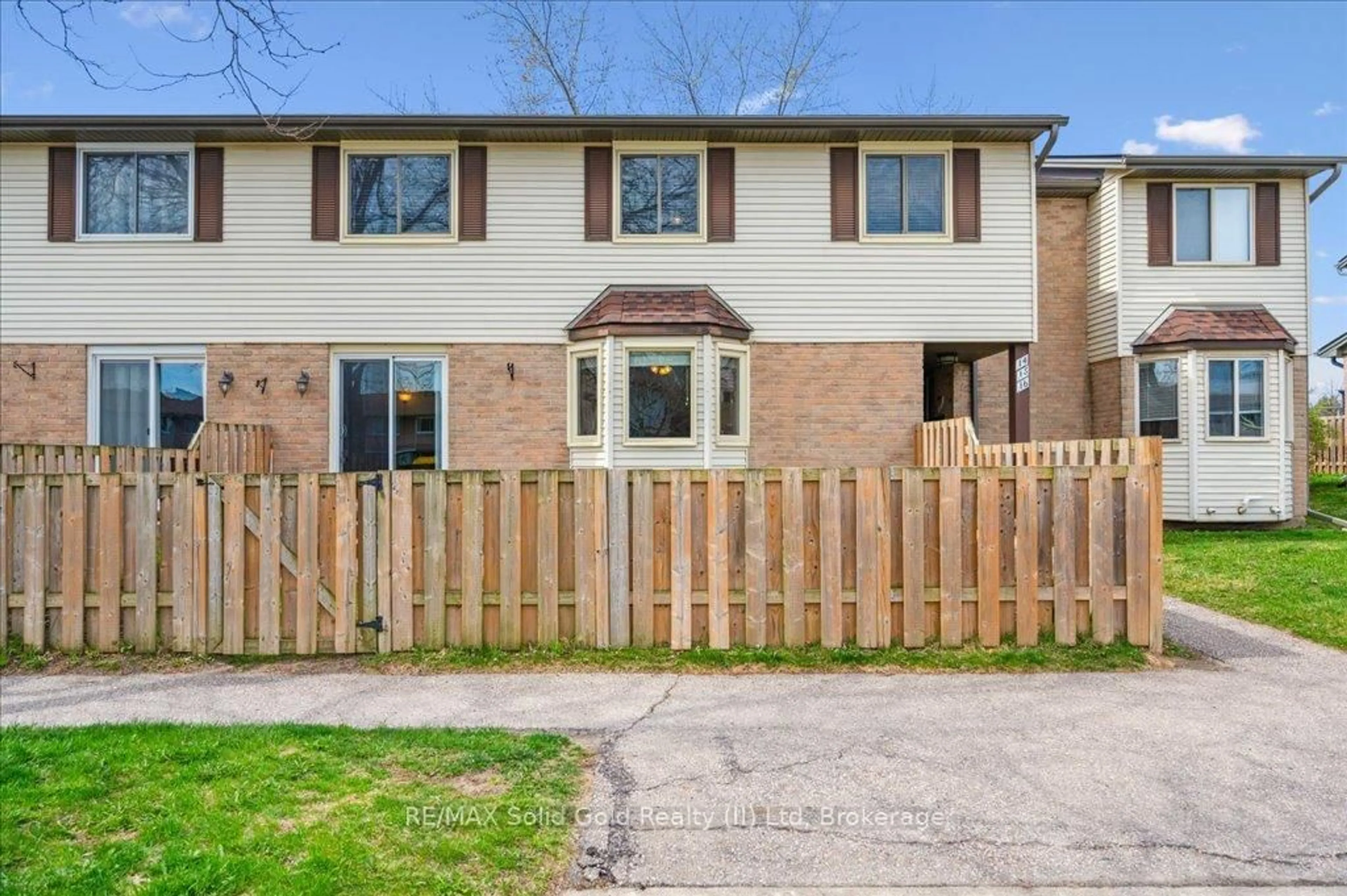 Home with brick exterior material, street for 700 Erinbrook Dr #16, Kitchener Ontario N2E 2S7