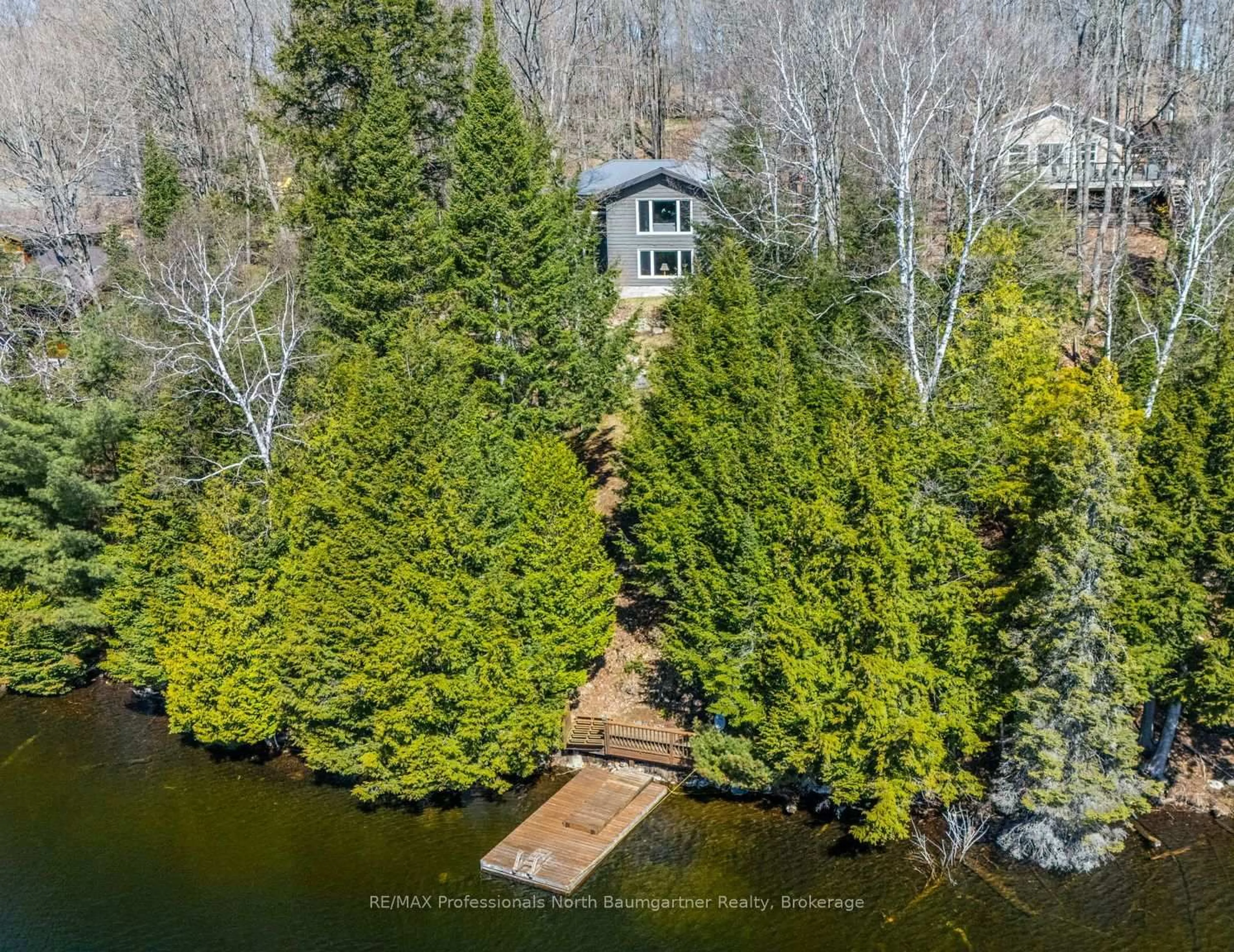 A pic from outside/outdoor area/front of a property/back of a property/a pic from drone, water/lake/river/ocean view for 1816 Trappers Trail Rd, Dysart et al Ontario K0M 1S0