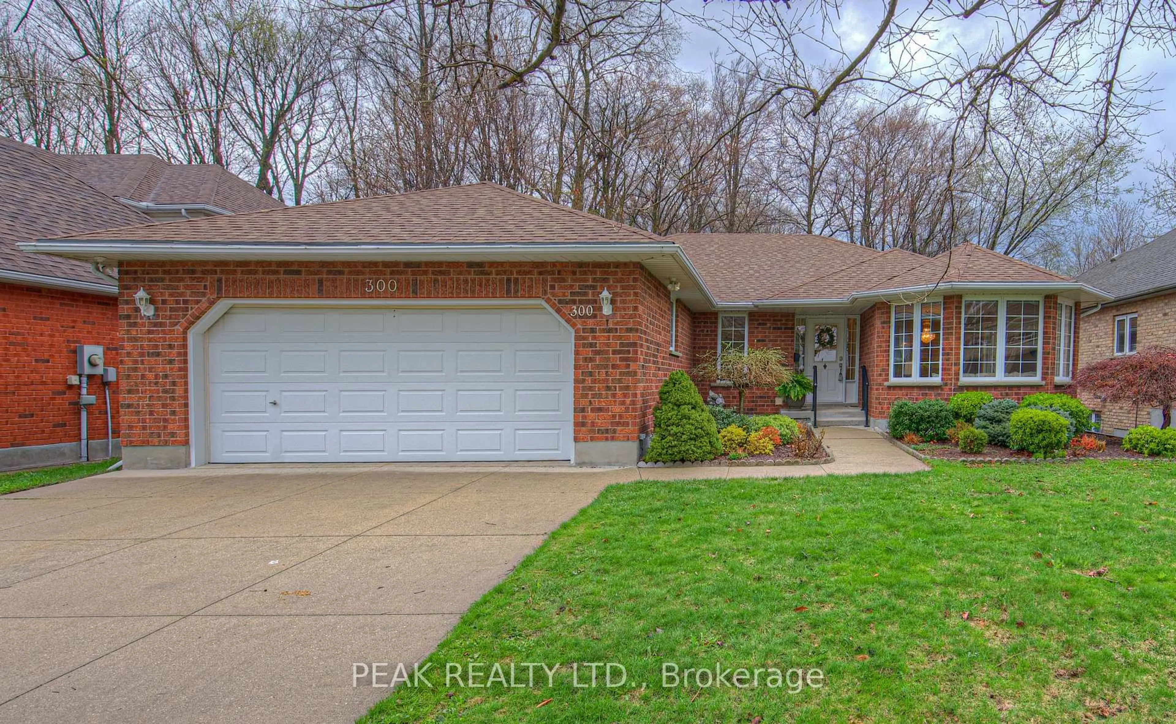 Home with brick exterior material, street for 300 Thorncrest Dr, Waterloo Ontario N2L 5R5