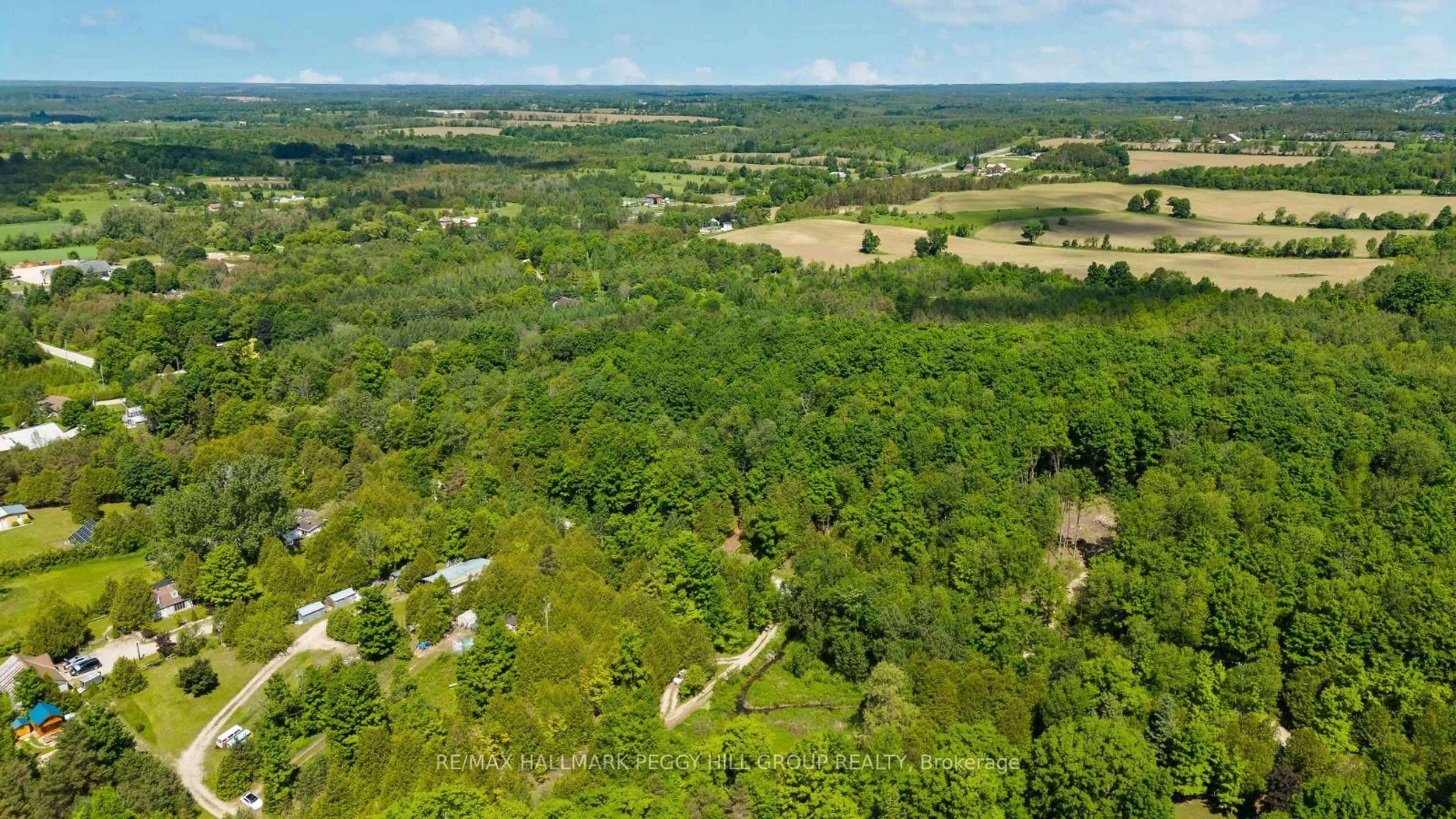A pic from outside/outdoor area/front of a property/back of a property/a pic from drone, forest/trees view for 263056 Wilder Lake Rd, Southgate Ontario N0G 1R0