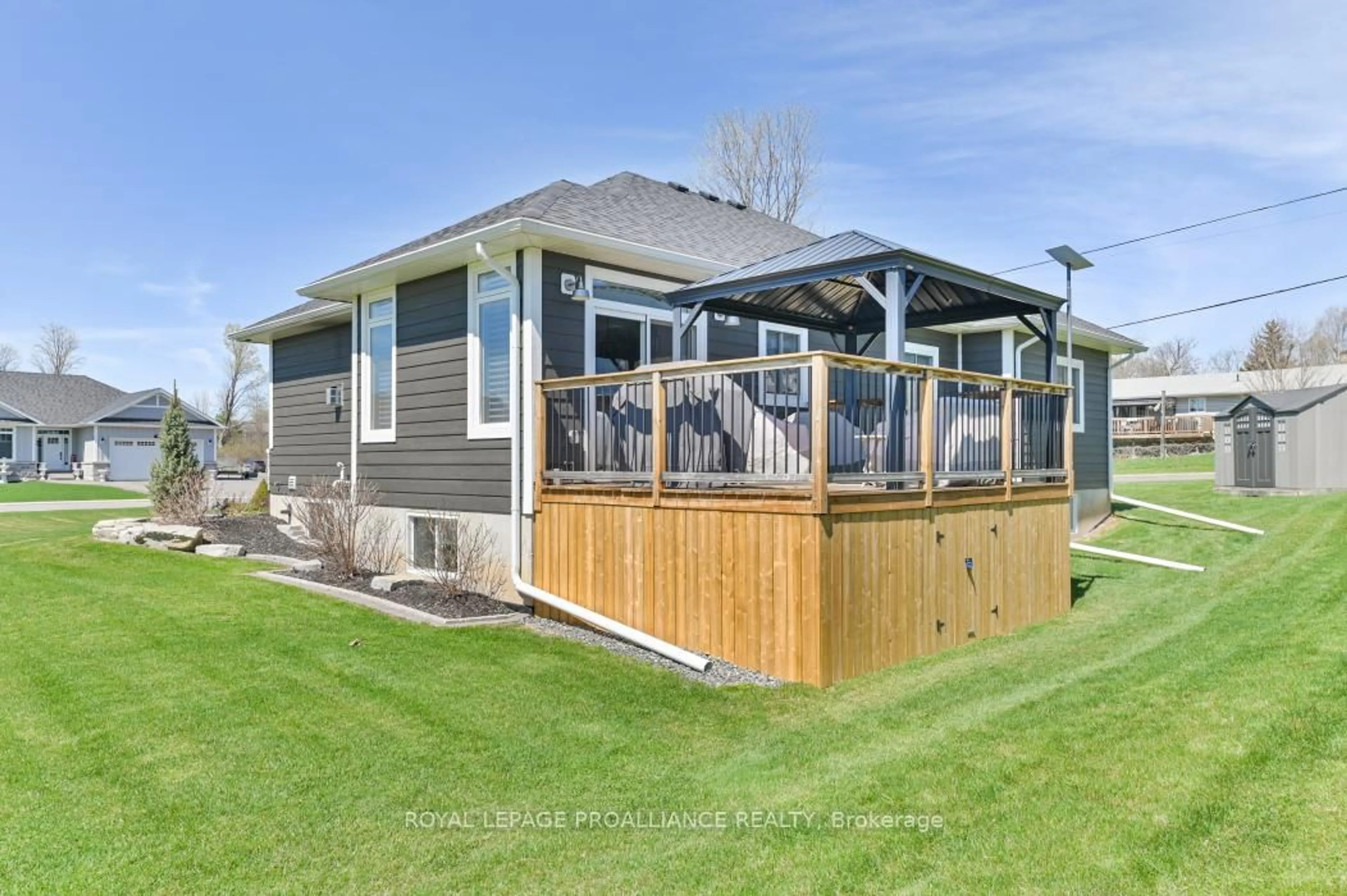 Home with vinyl exterior material, water/lake/river/ocean view for 135 Rollins St, Madoc Ontario K0K 2K0