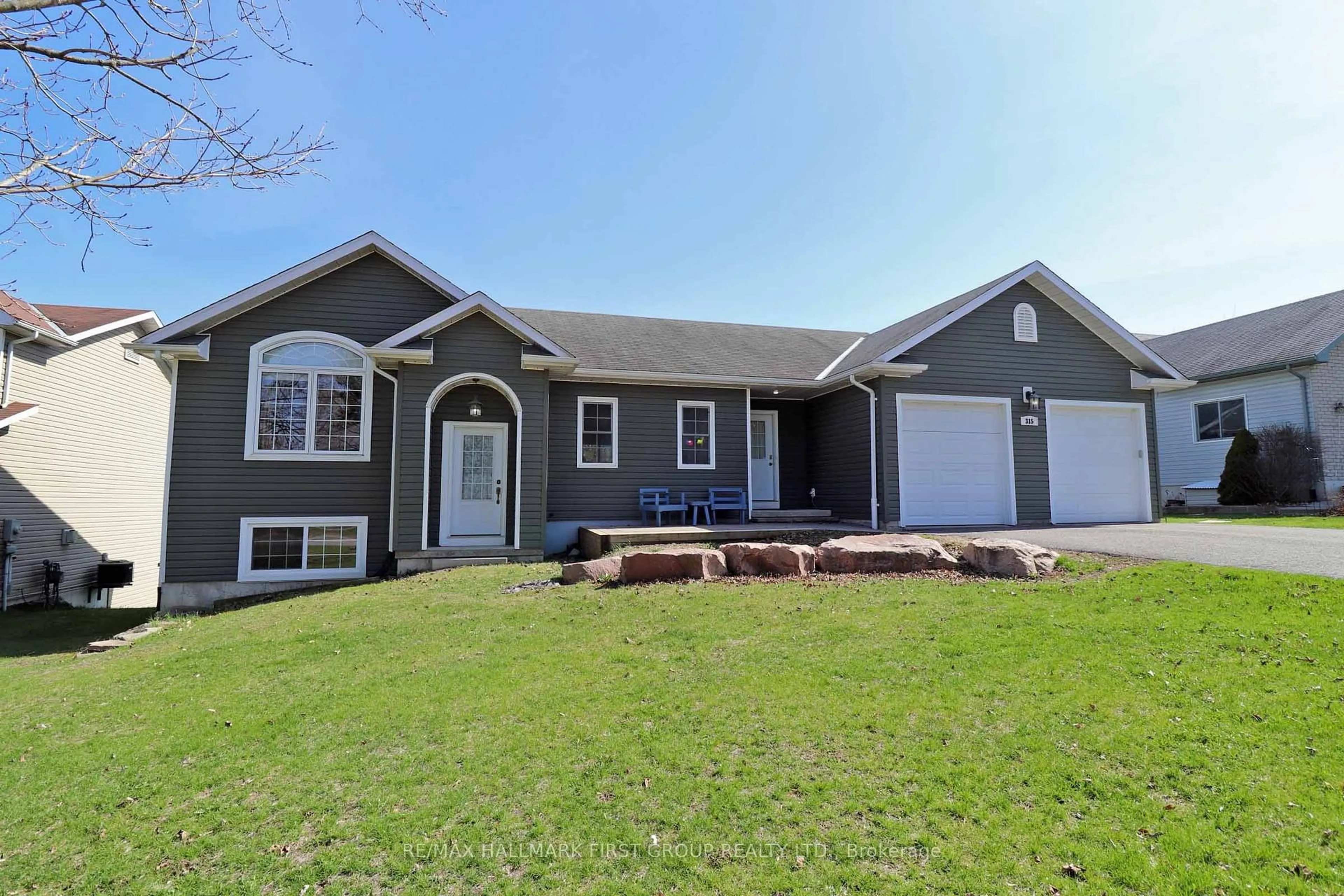 Home with vinyl exterior material, street for 315 River St, Tweed Ontario K0K 3J0