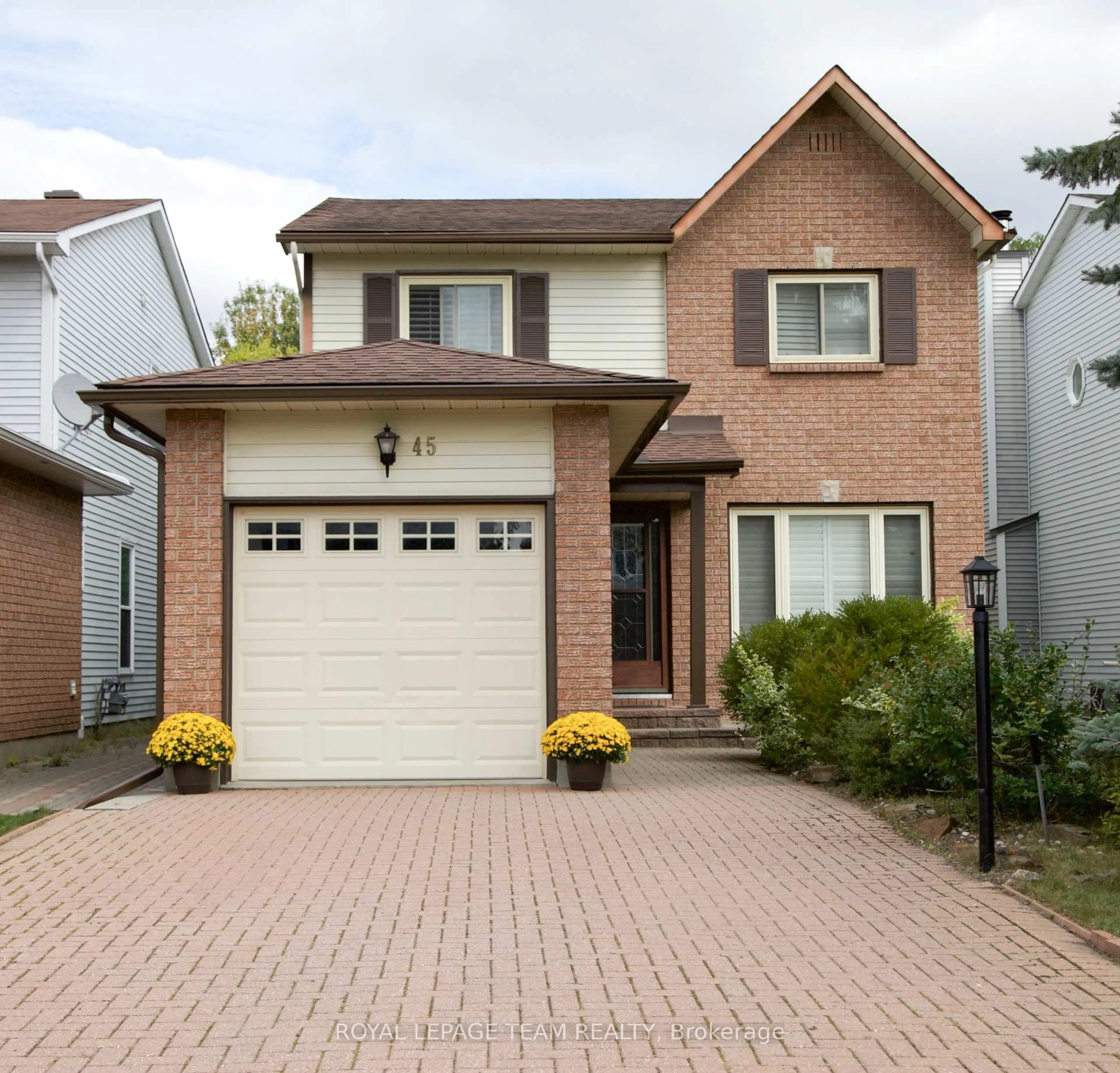 Home with brick exterior material, street for 45 Denham Way, Stittsville Ontario K2S 1H8