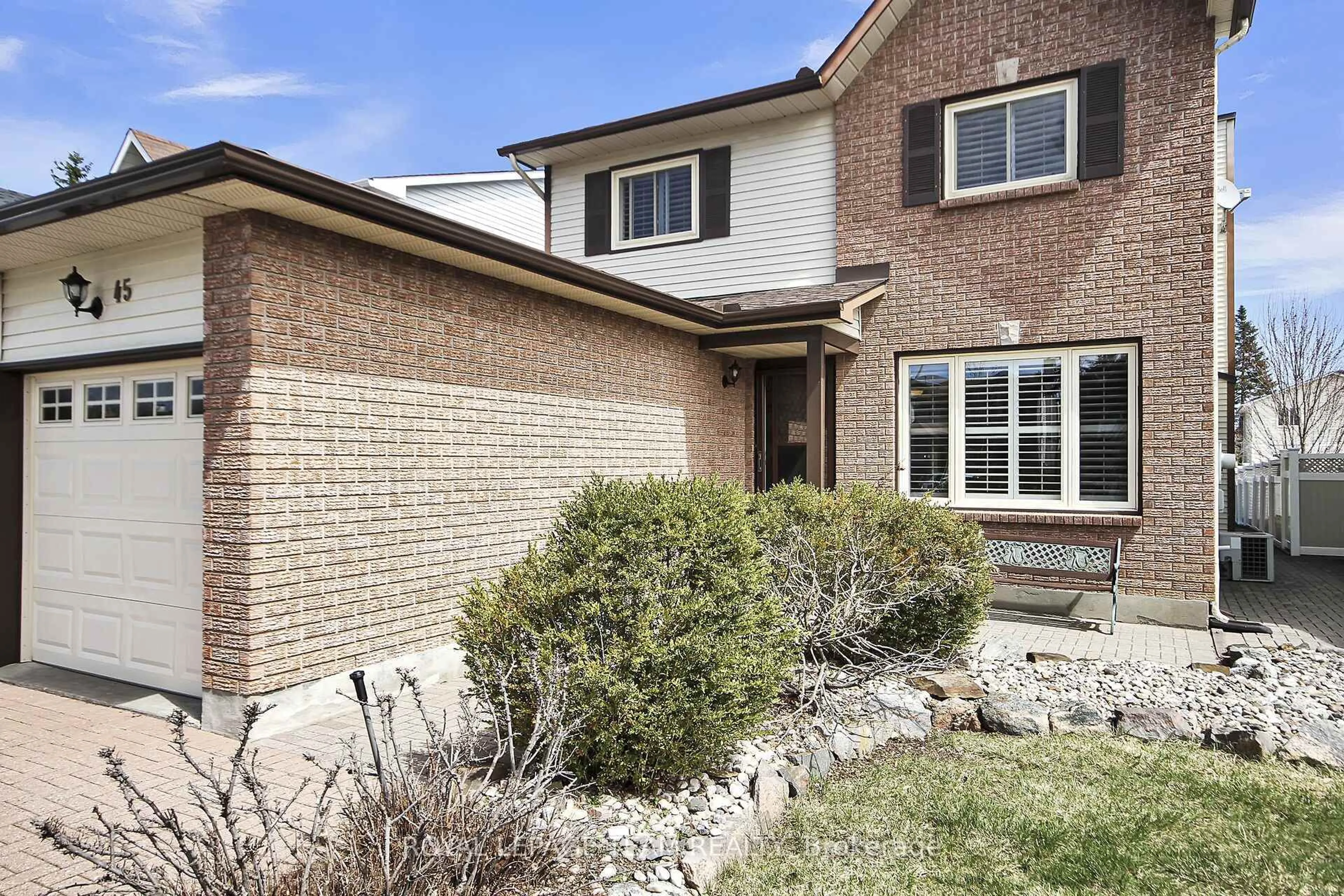 Home with brick exterior material, street for 45 Denham Way, Stittsville Ontario K2S 1H8