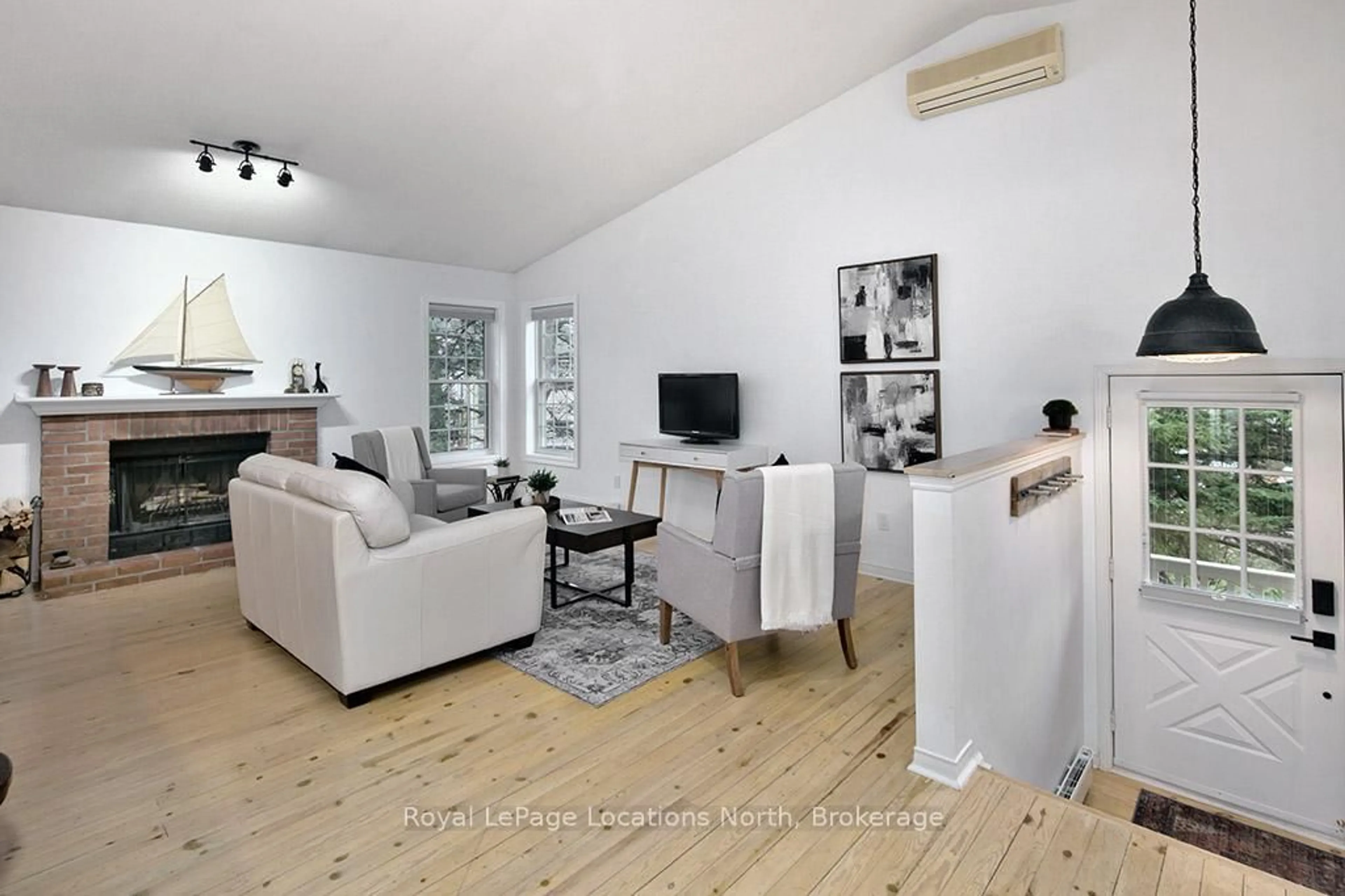 Living room with furniture, wood/laminate floor for 150 VICTORIA St #159, Blue Mountains Ontario N0H 2P0