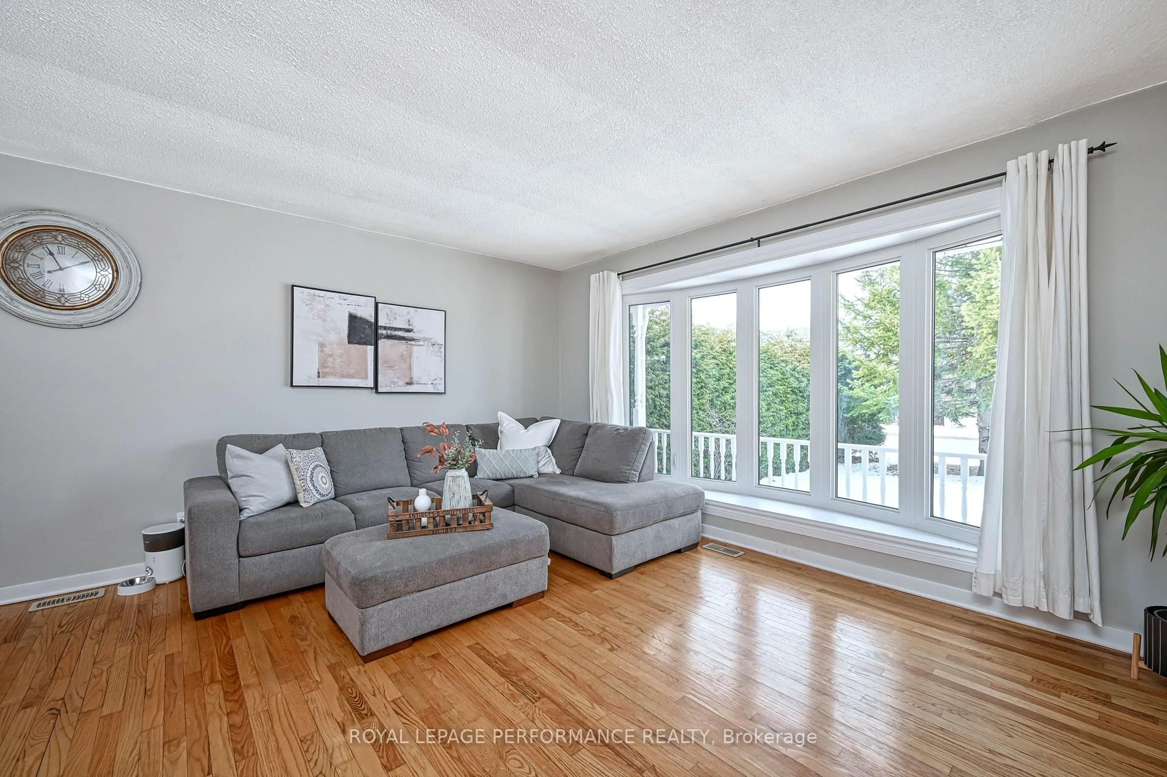 Living room with furniture, wood/laminate floor for 11 Princess St, Carleton Place Ontario K7C 2M6