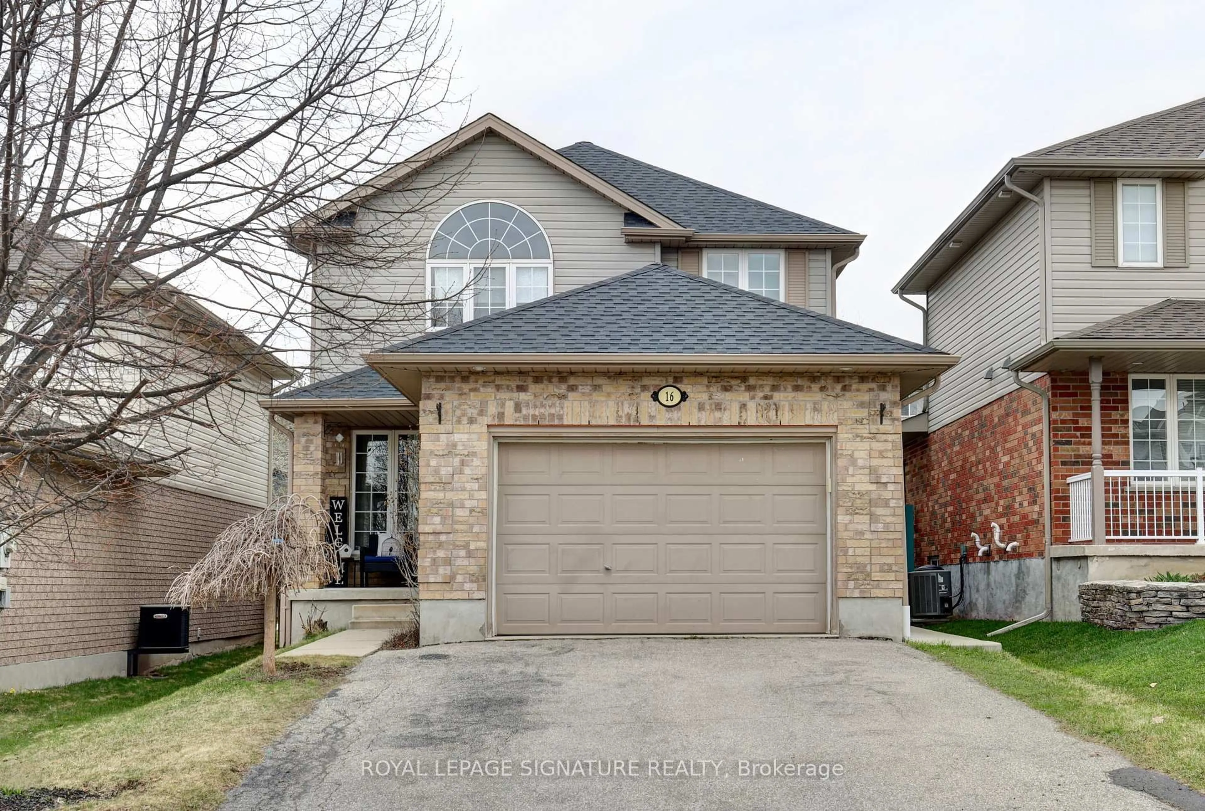 Home with brick exterior material, street for 16 Valleyhaven Lane, Guelph Ontario N1E 0A3