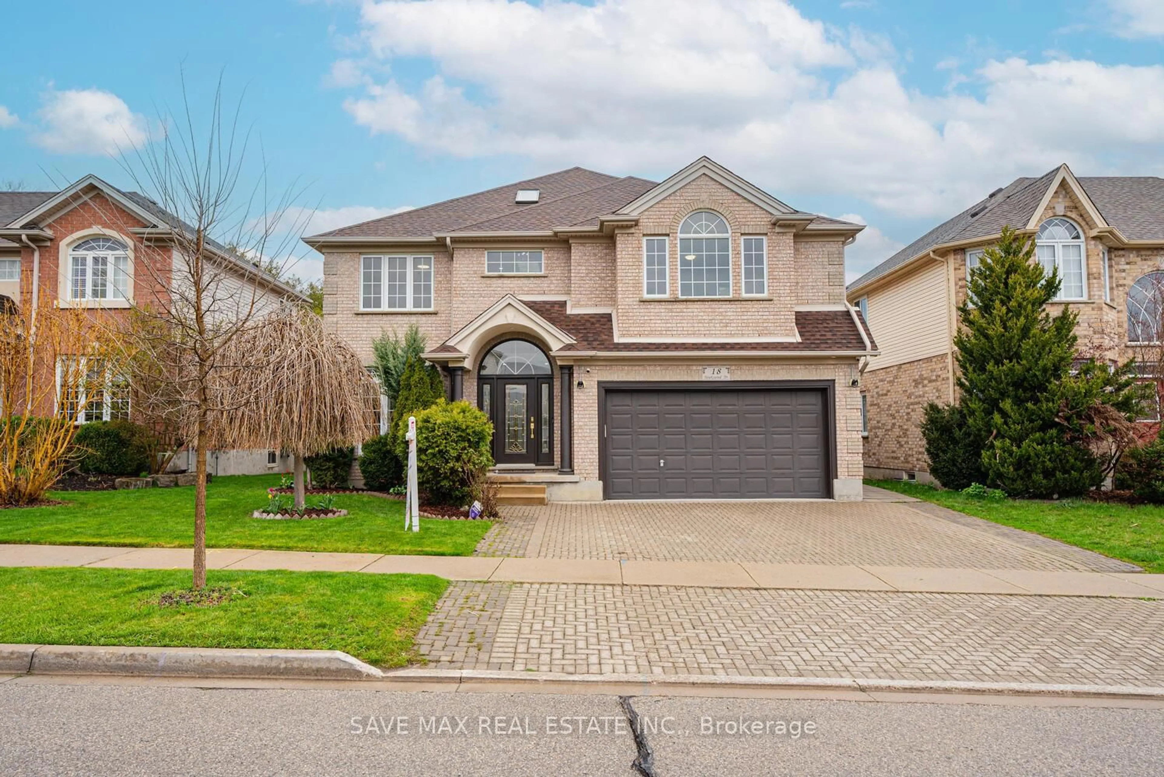 Home with brick exterior material, street for 18 Hawkswood Dr, Kitchener Ontario N2K 4J6