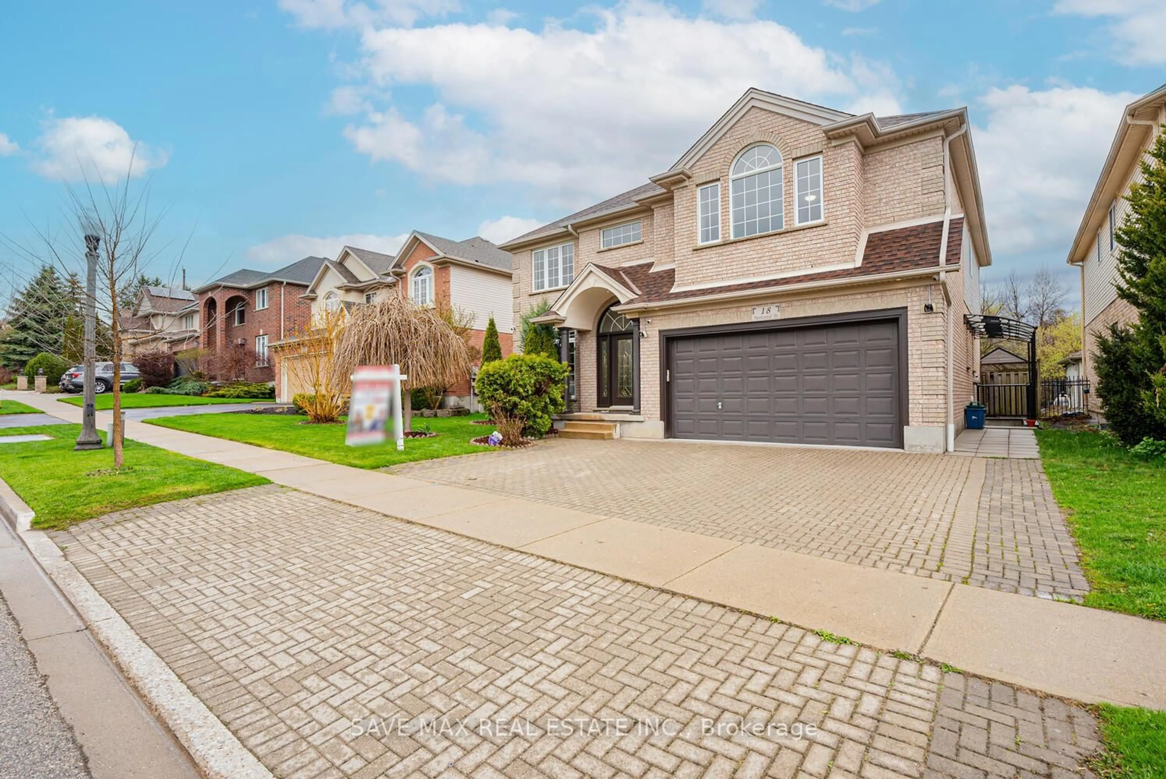Home with brick exterior material, street for 18 Hawkswood Dr, Kitchener Ontario N2K 4J6