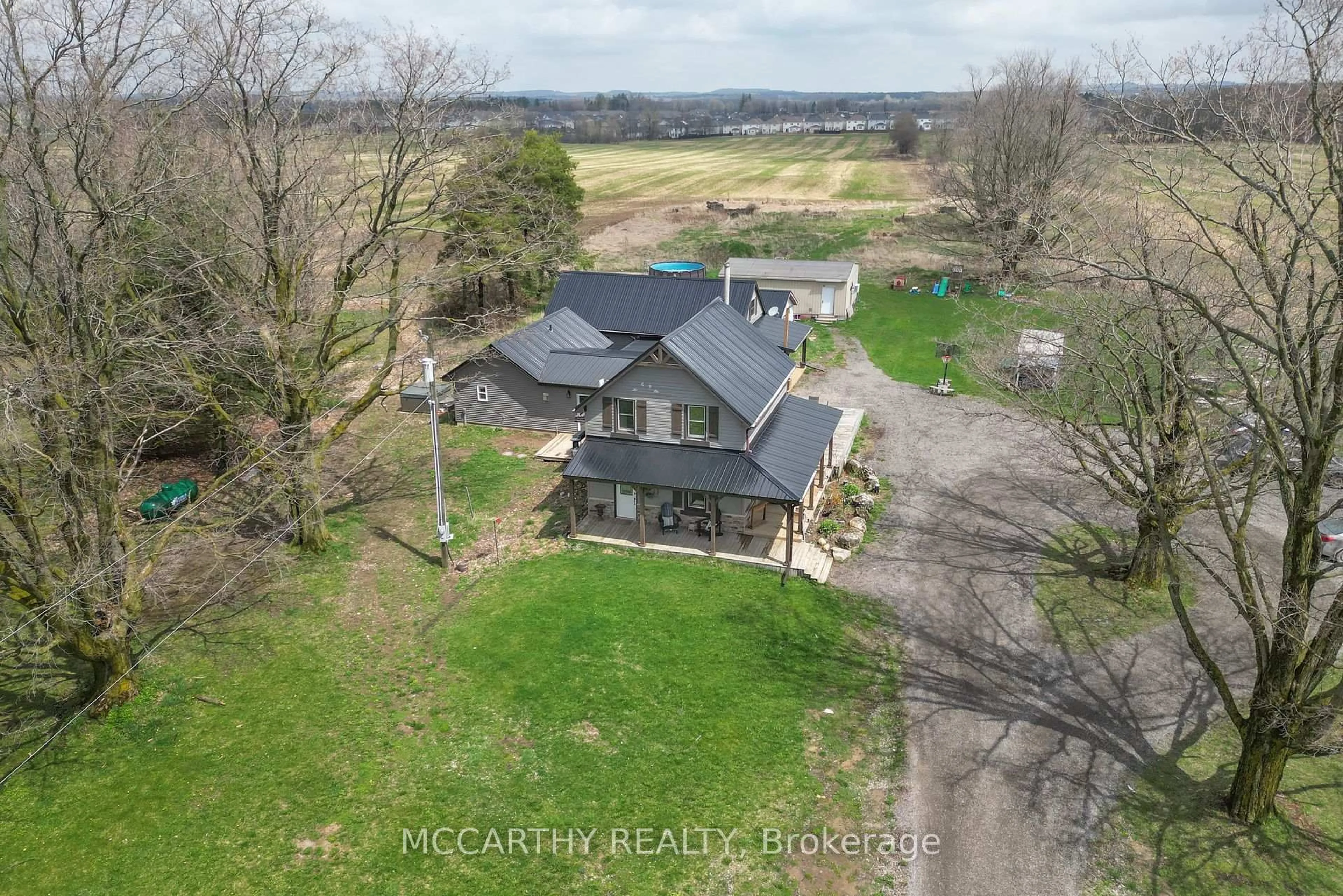 A pic from outside/outdoor area/front of a property/back of a property/a pic from drone, water/lake/river/ocean view for 436139 4th Line, Melancthon Ontario L9V 2V2
