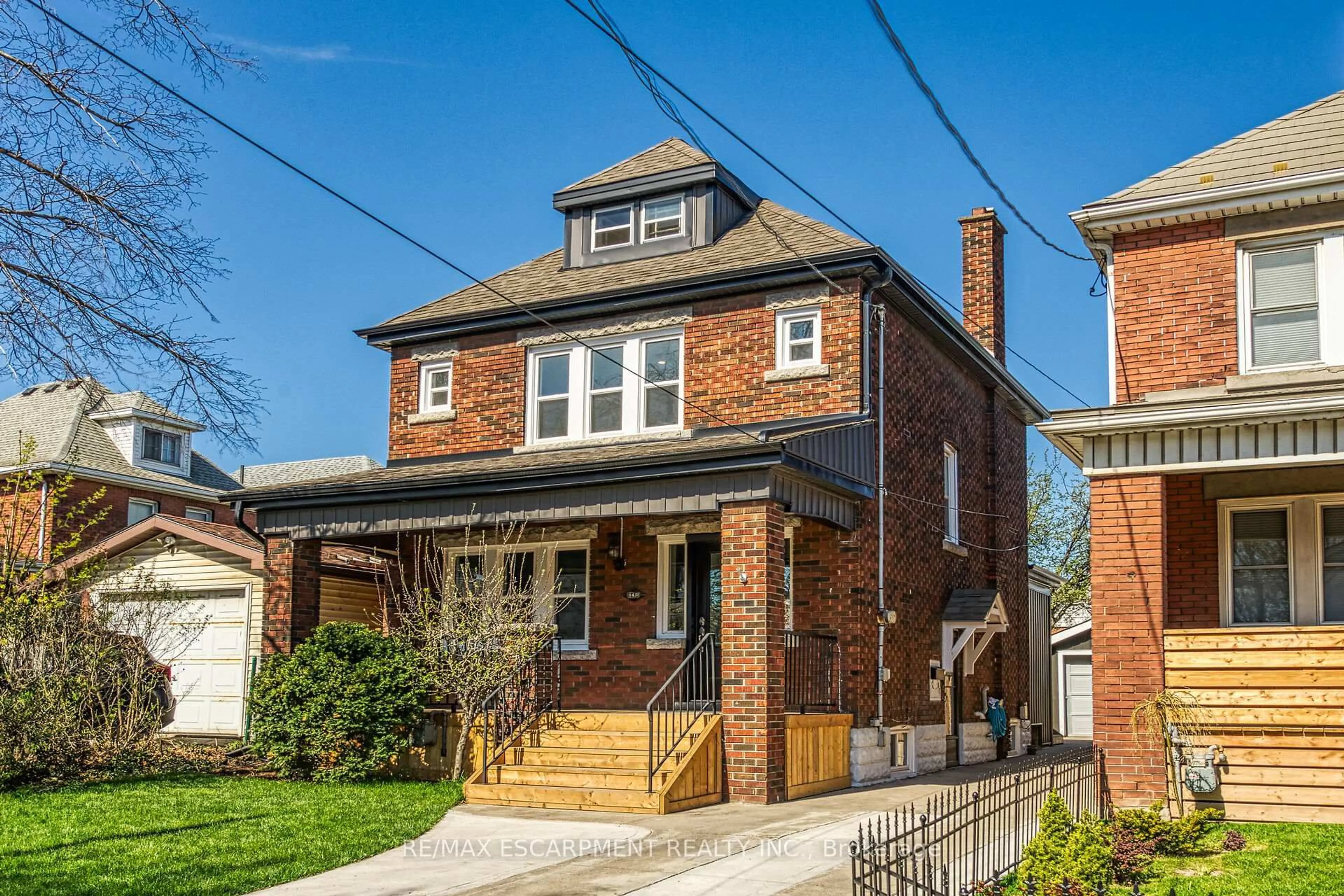 Home with brick exterior material, street for 145 Prospect St, Hamilton Ontario L8L 6X8