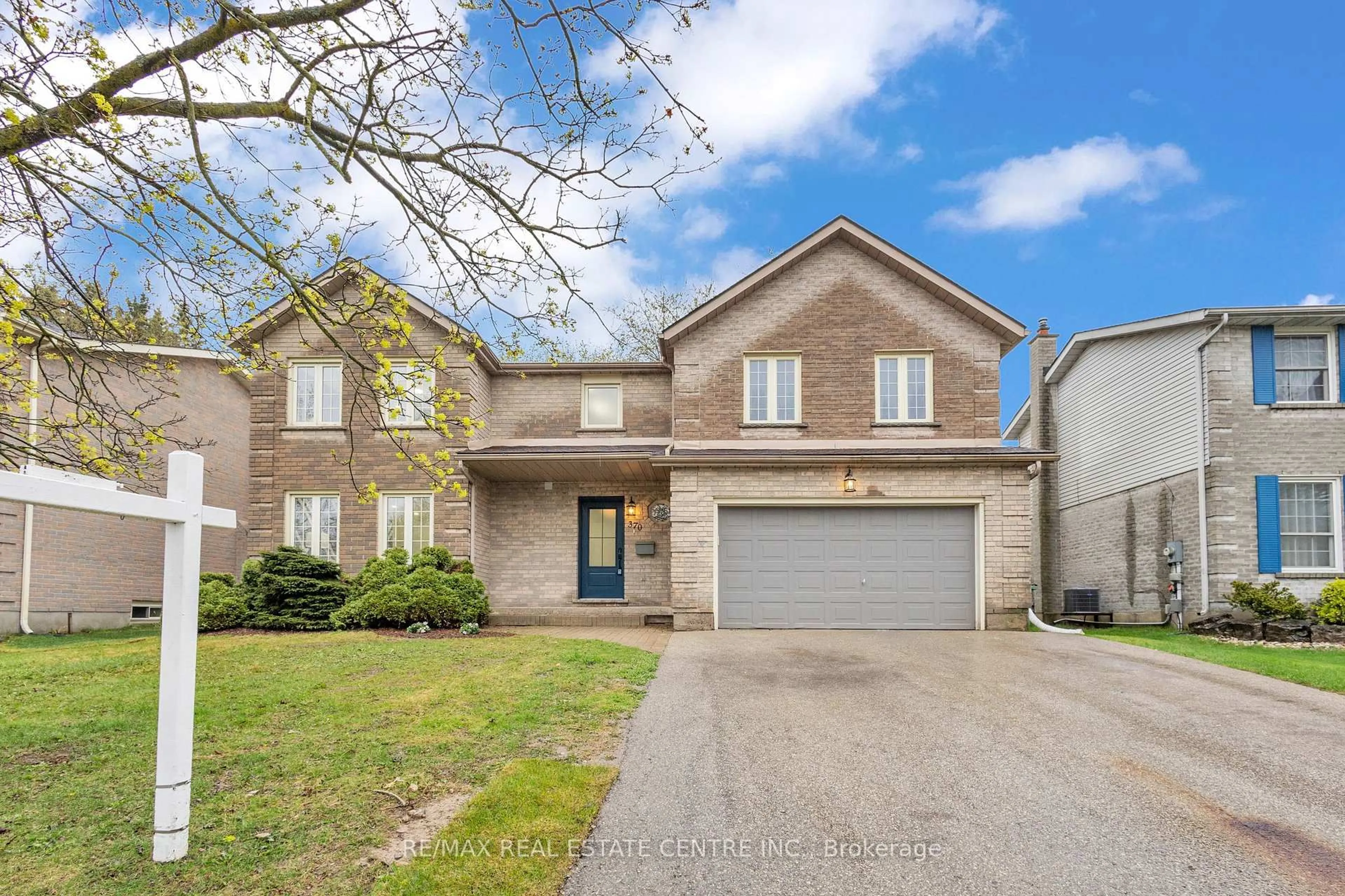 Home with brick exterior material, street for 370 Ironwood Rd, Guelph Ontario N1G 3N8