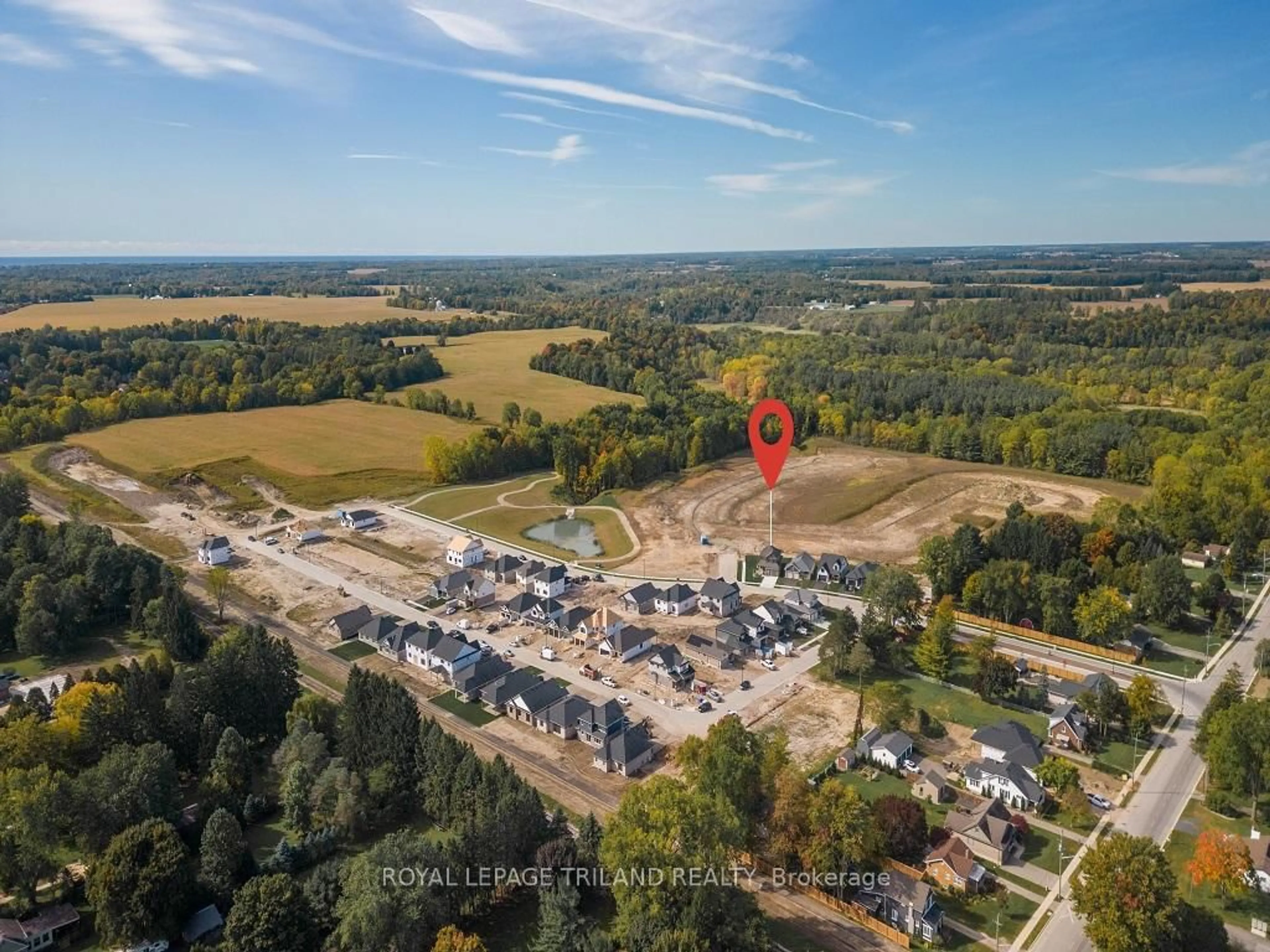 A pic from outside/outdoor area/front of a property/back of a property/a pic from drone, unknown for 31 SNOWY OWL Tr, Central Elgin Ontario N5R 0M6