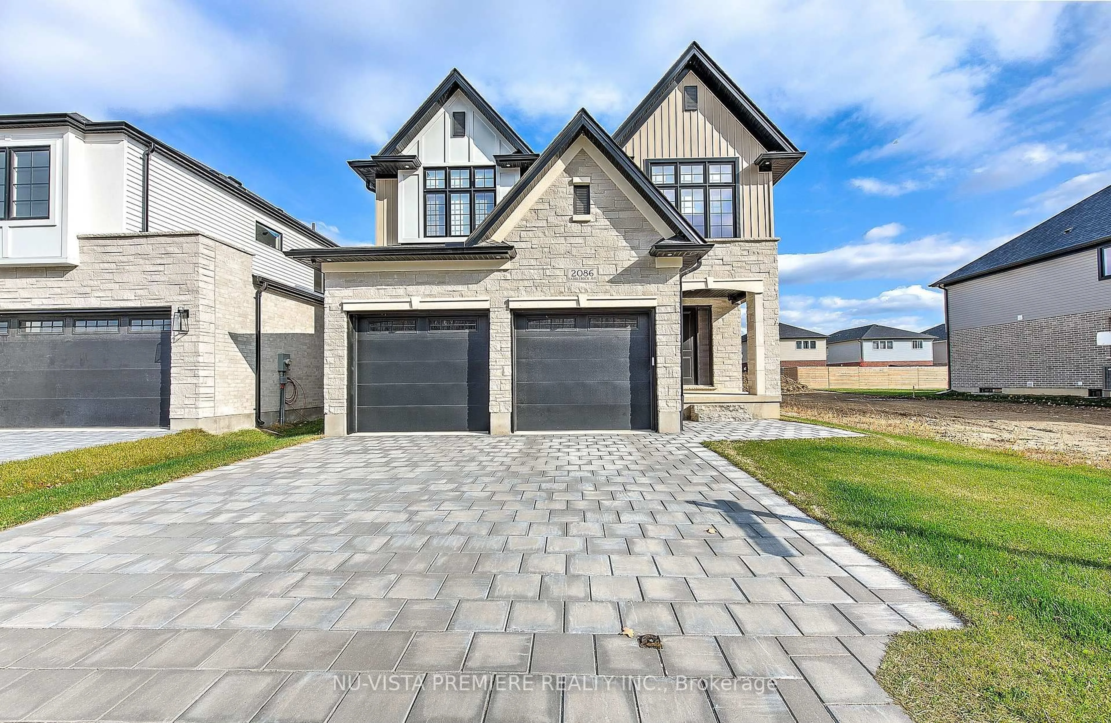 Home with brick exterior material, street for 2086 Saddlerock Ave, London North Ontario N6G 3W3