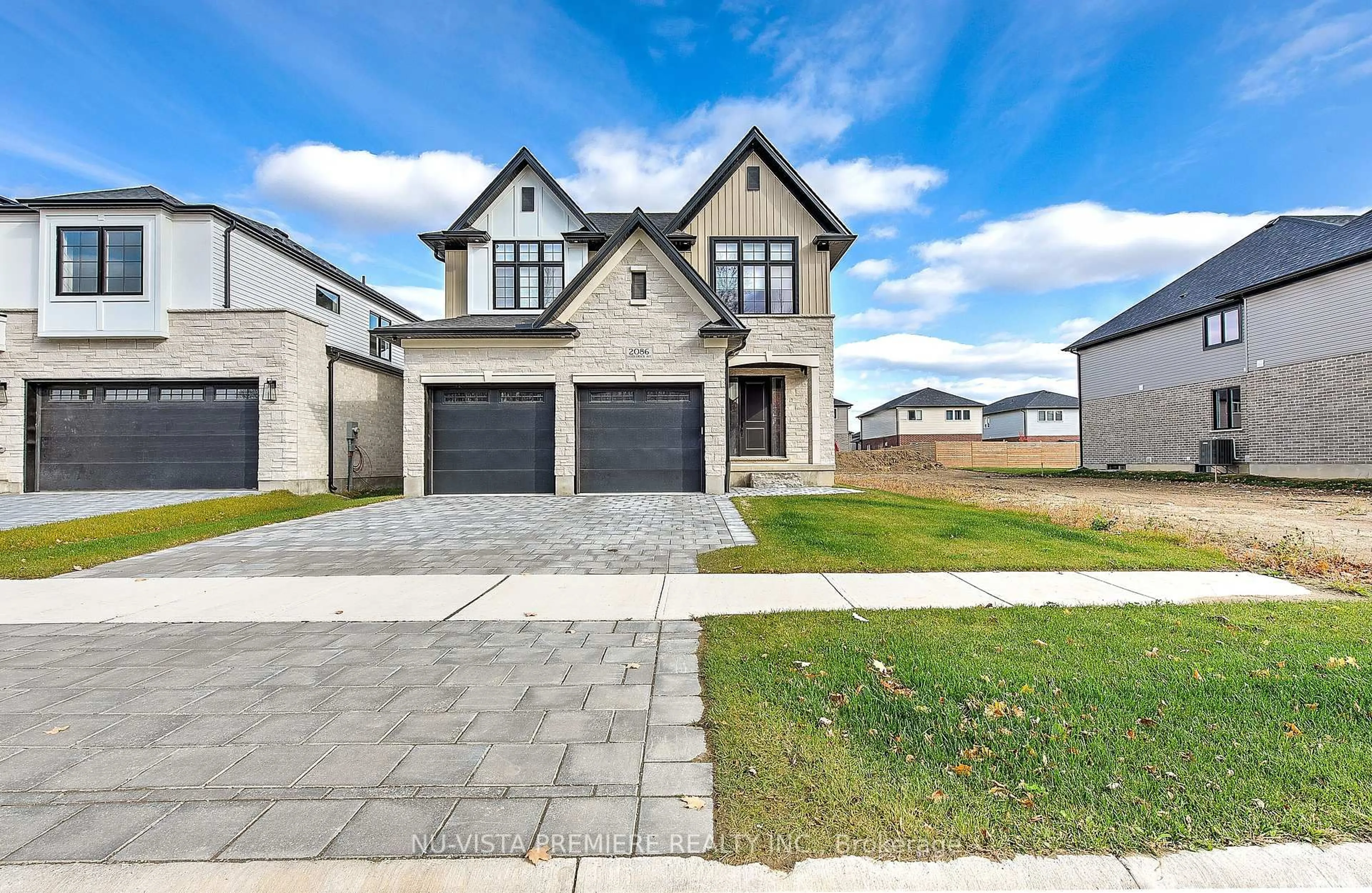 Home with brick exterior material, street for 2086 Saddlerock Ave, London North Ontario N6G 3W3