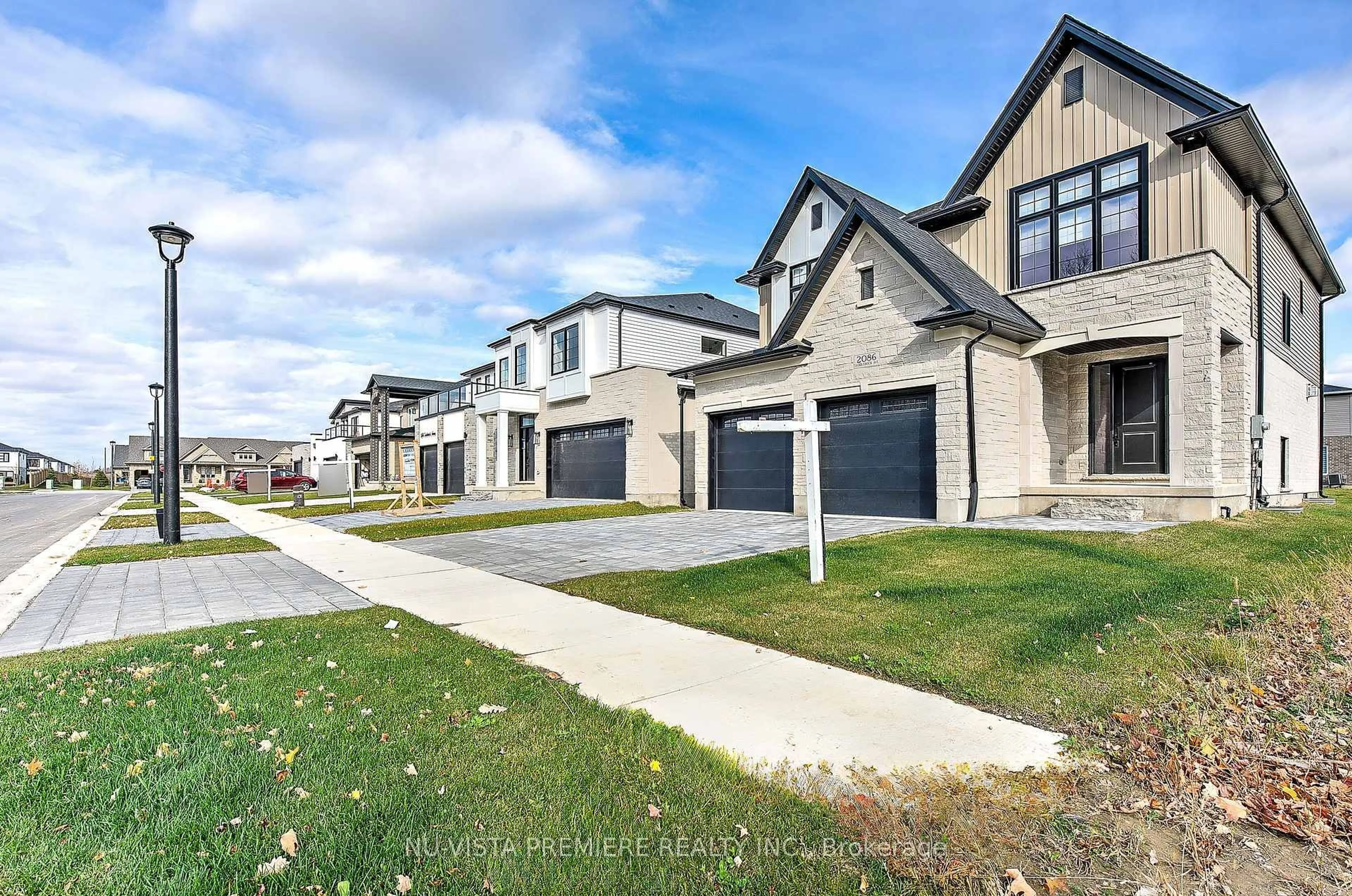 A pic from outside/outdoor area/front of a property/back of a property/a pic from drone, street for 2086 Saddlerock Ave, London North Ontario N6G 3W3
