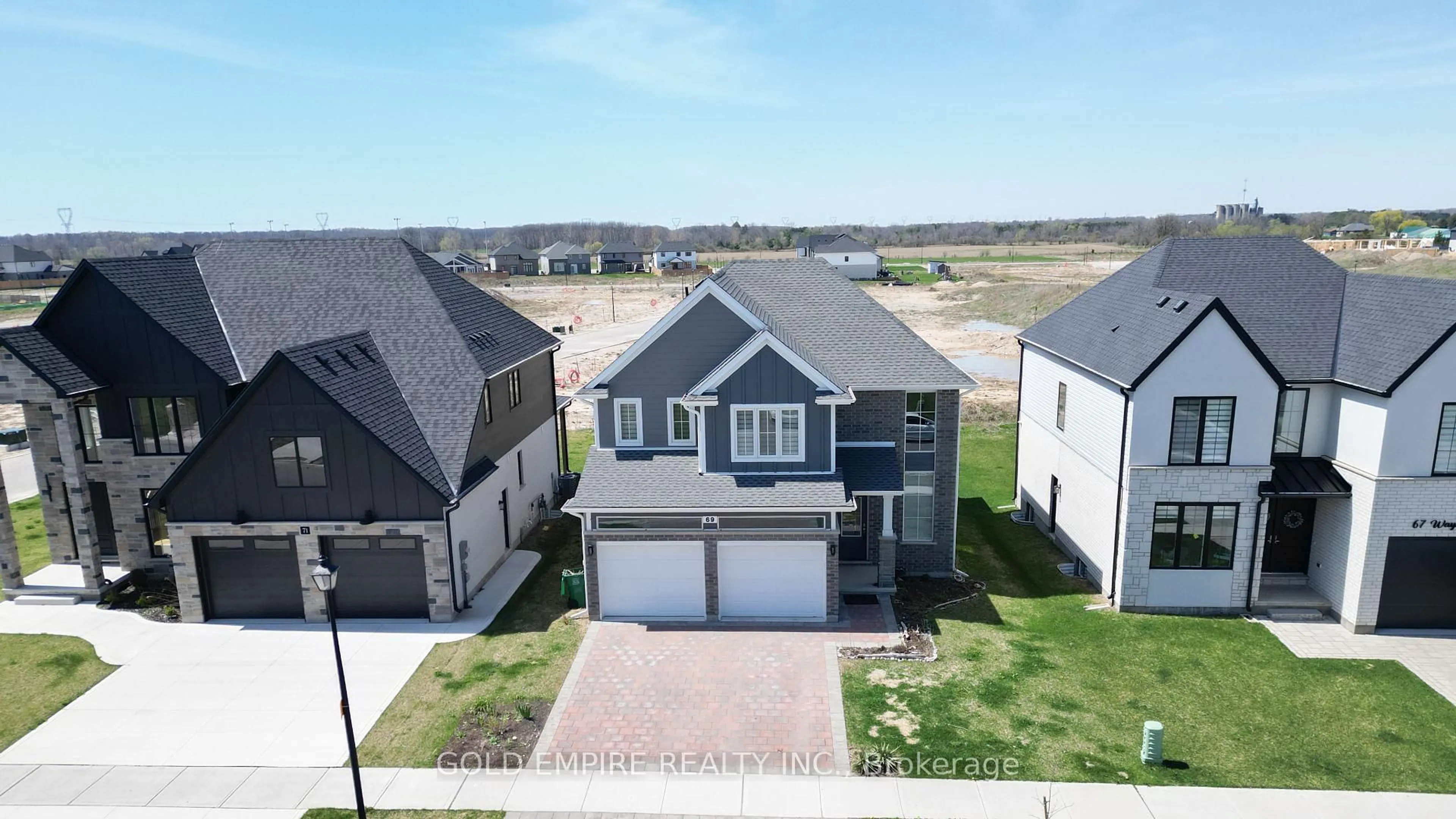 A pic from outside/outdoor area/front of a property/back of a property/a pic from drone, street for 69 wayside Lane, Southwold Ontario N5P 0H2
