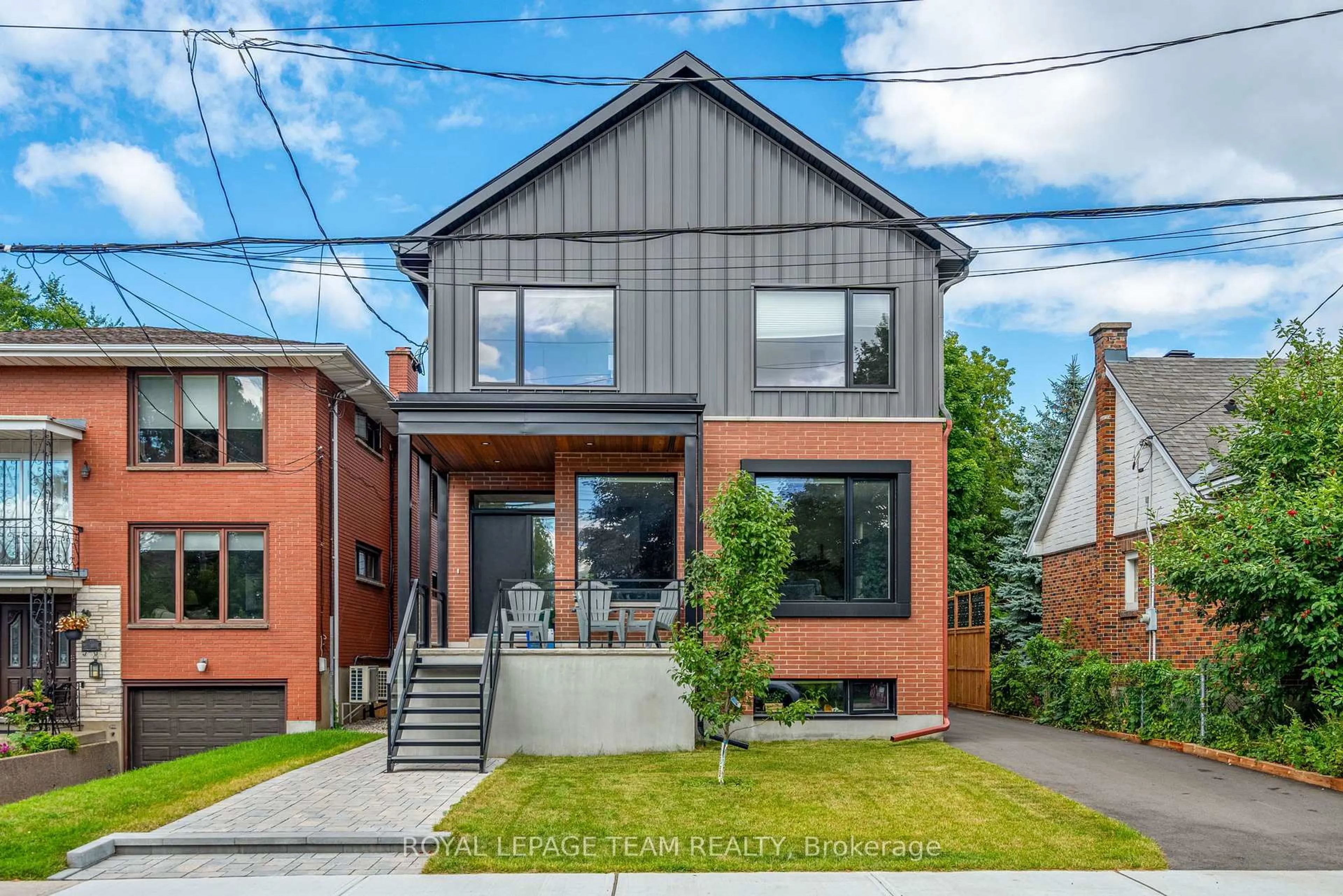 Home with brick exterior material, street for 241 Breezehill Ave #B/B2, Ottawa Ontario K1Y 2J2