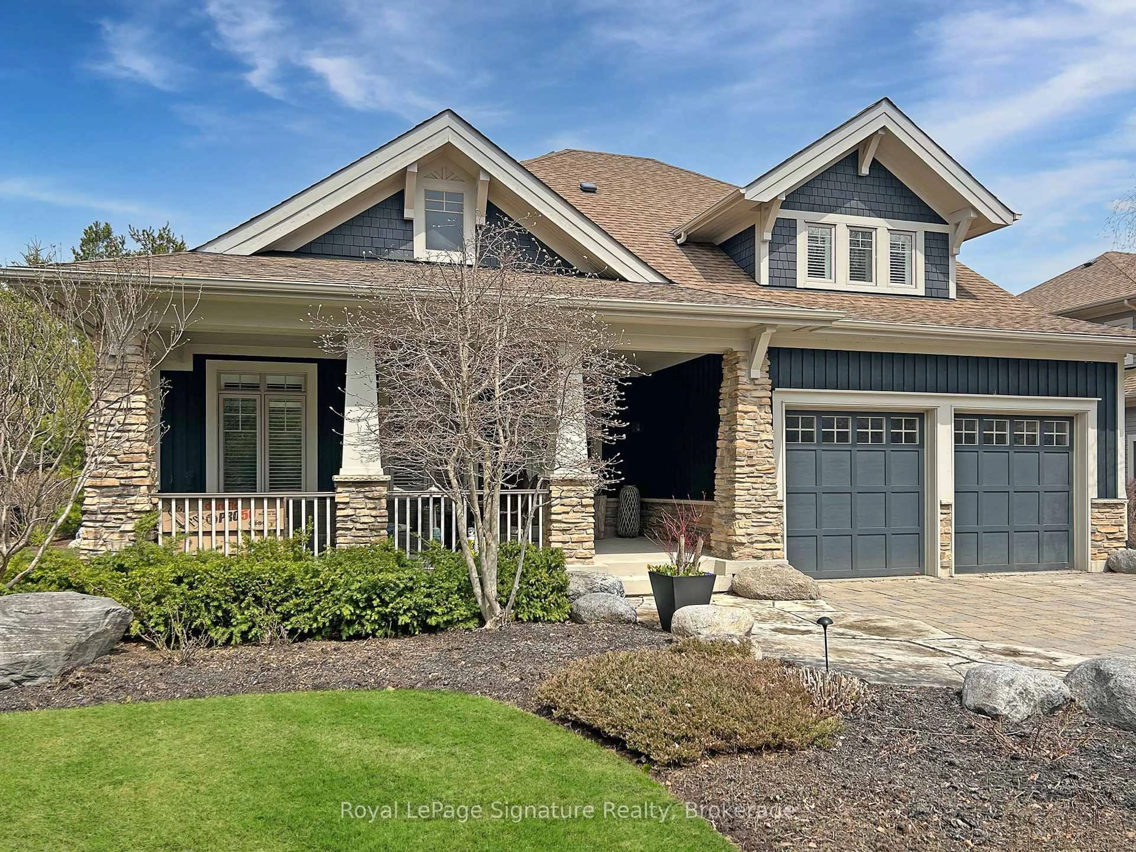 Home with brick exterior material, street for 149 East Ridge Dr, Blue Mountains Ontario N0H 2P0