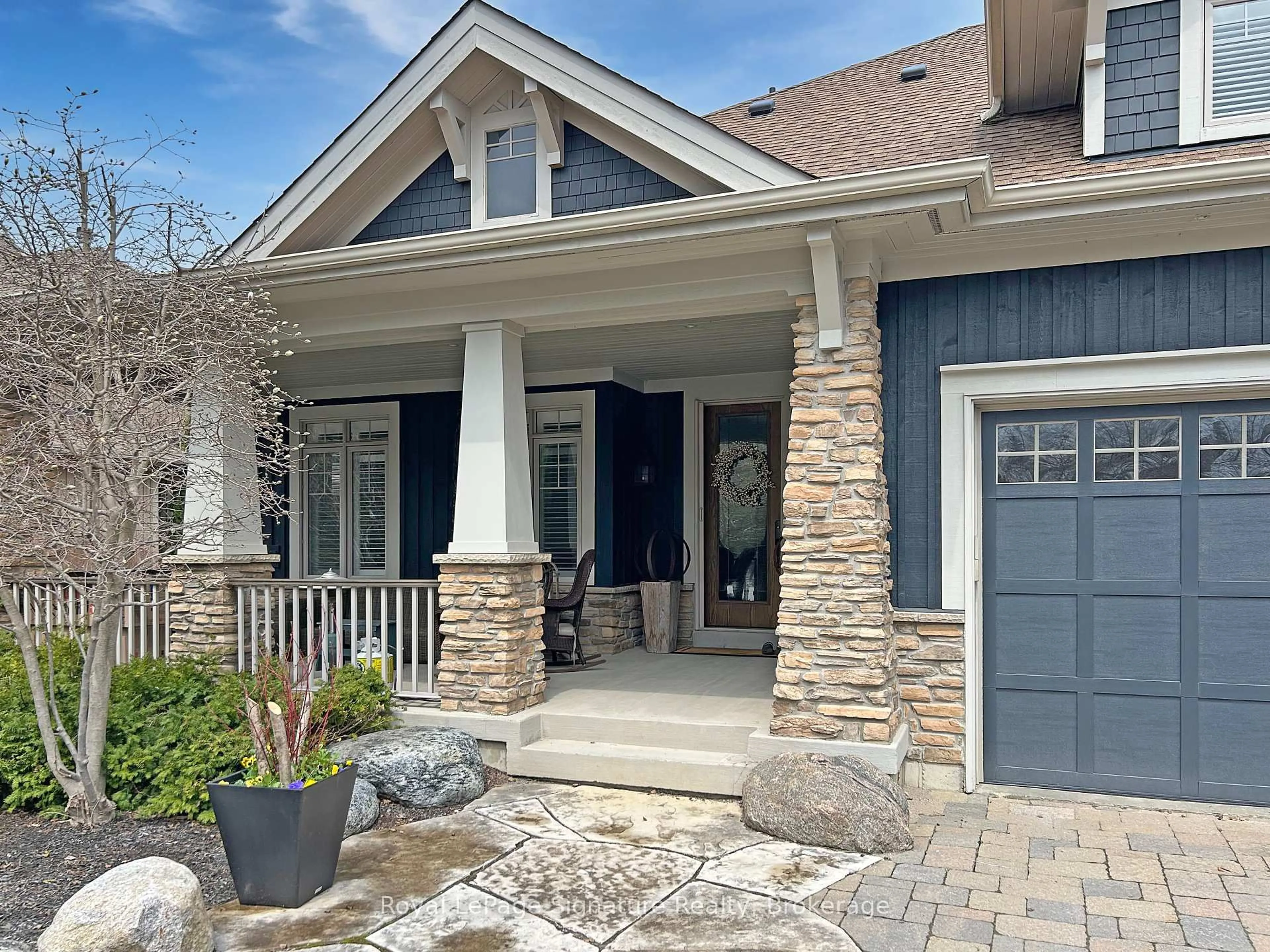 Home with brick exterior material, street for 149 East Ridge Dr, Blue Mountains Ontario N0H 2P0