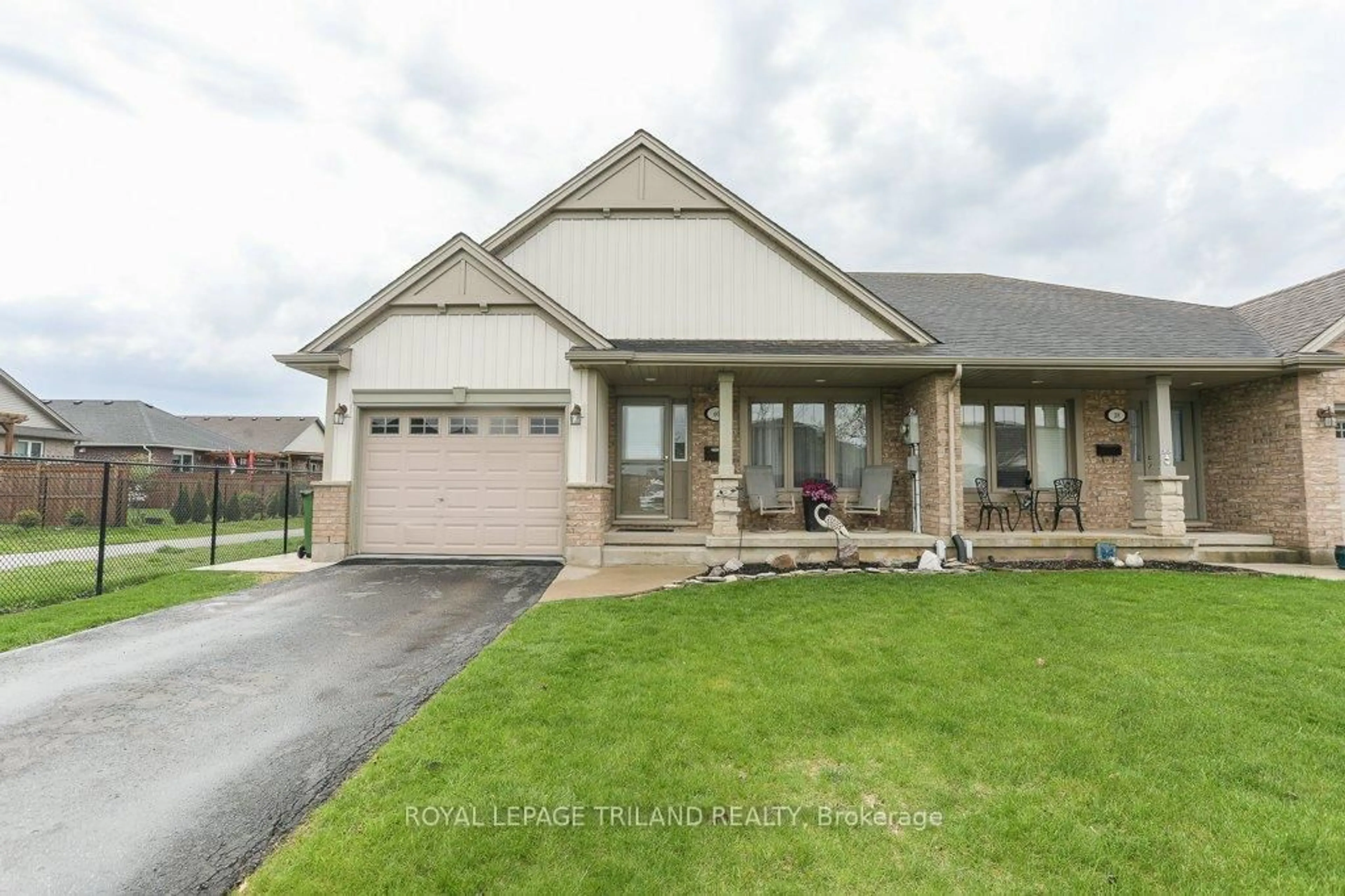 Home with brick exterior material, street for 40 Pear Tree Ave, St. Thomas Ontario N5R 1L2