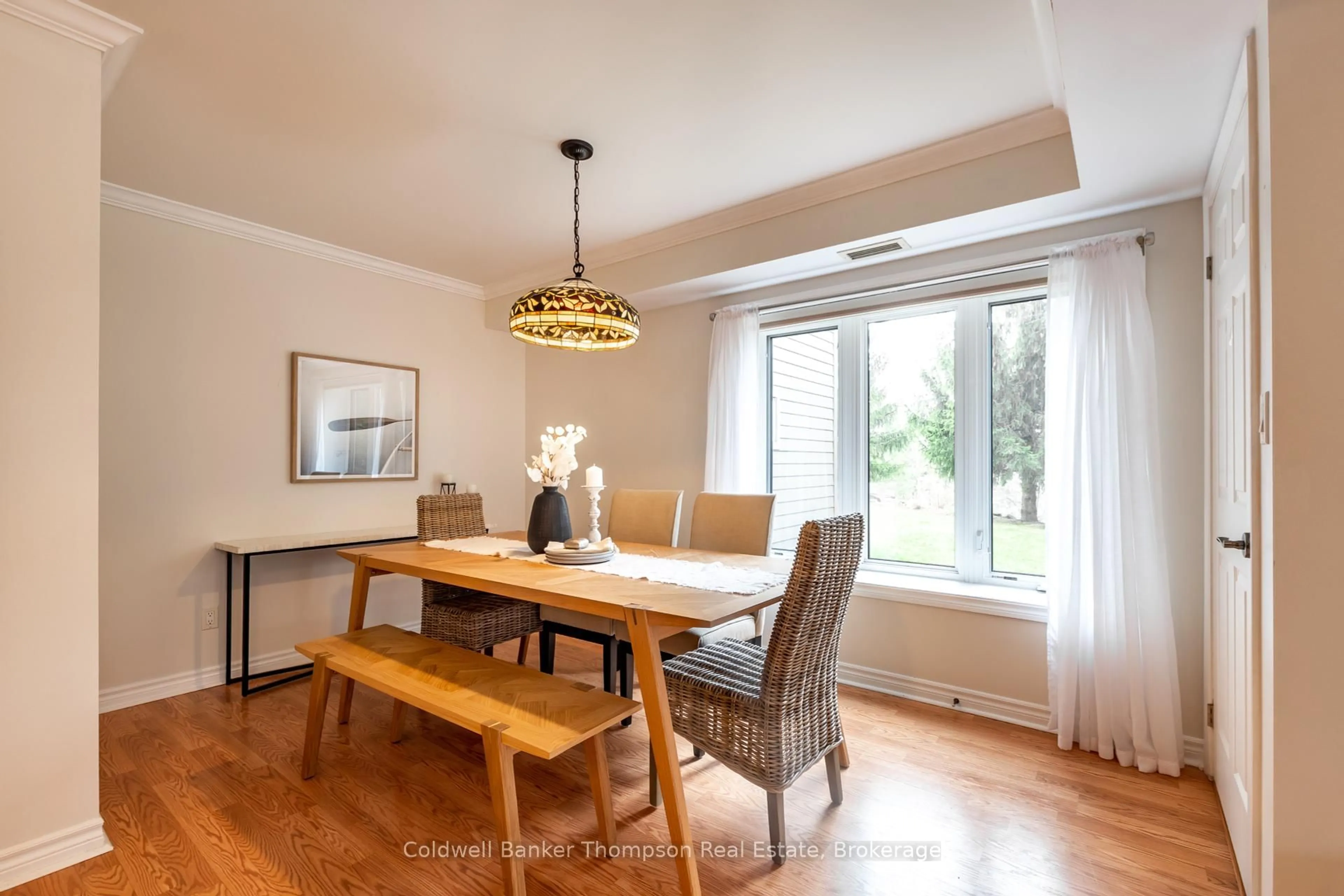 Dining room, wood/laminate floor for 24 Dairy Lane #101, Huntsville Ontario P1H 0A4