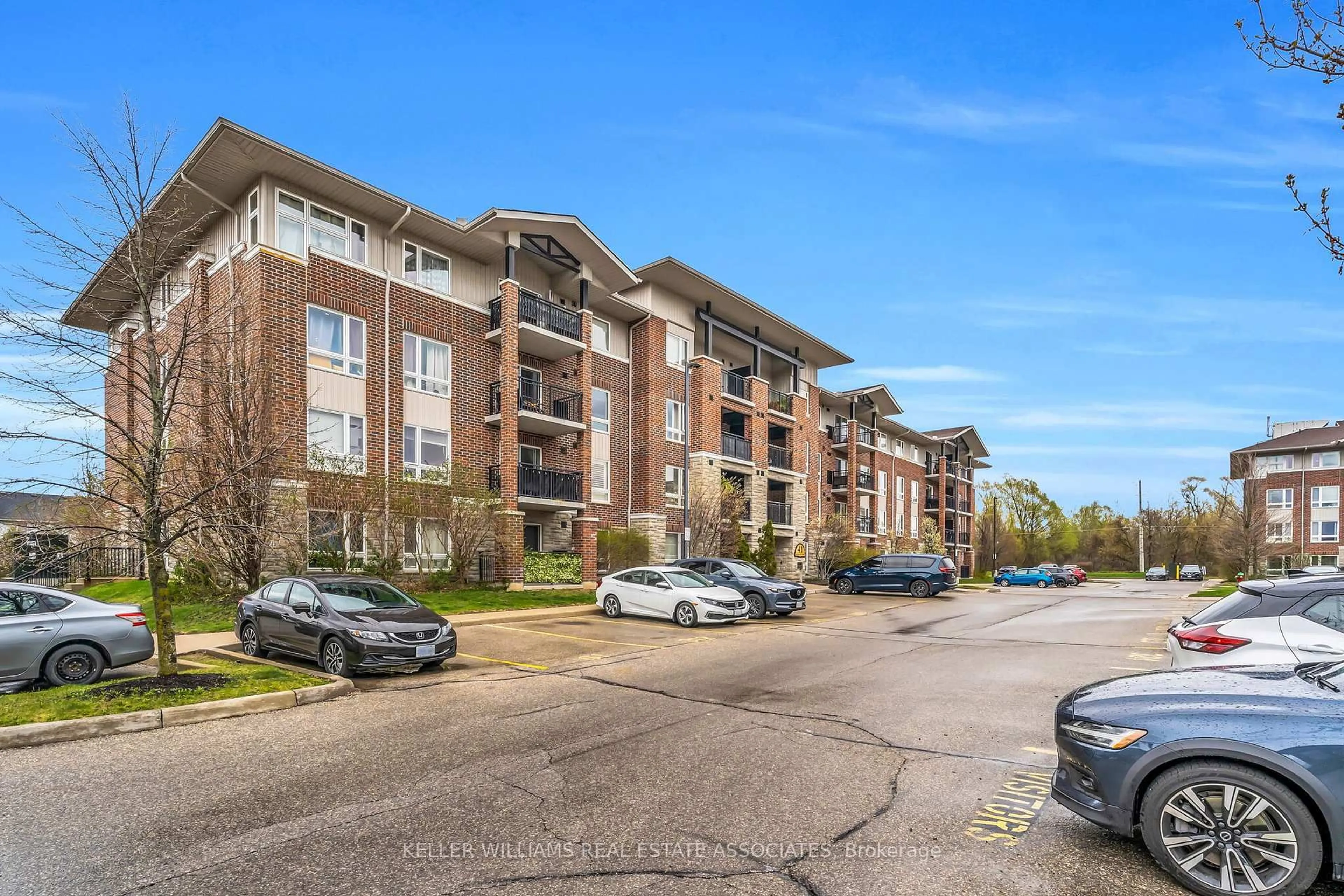 A pic from outside/outdoor area/front of a property/back of a property/a pic from drone, unknown for 41 Goodwin Dr #401, Guelph Ontario N1L 0E5