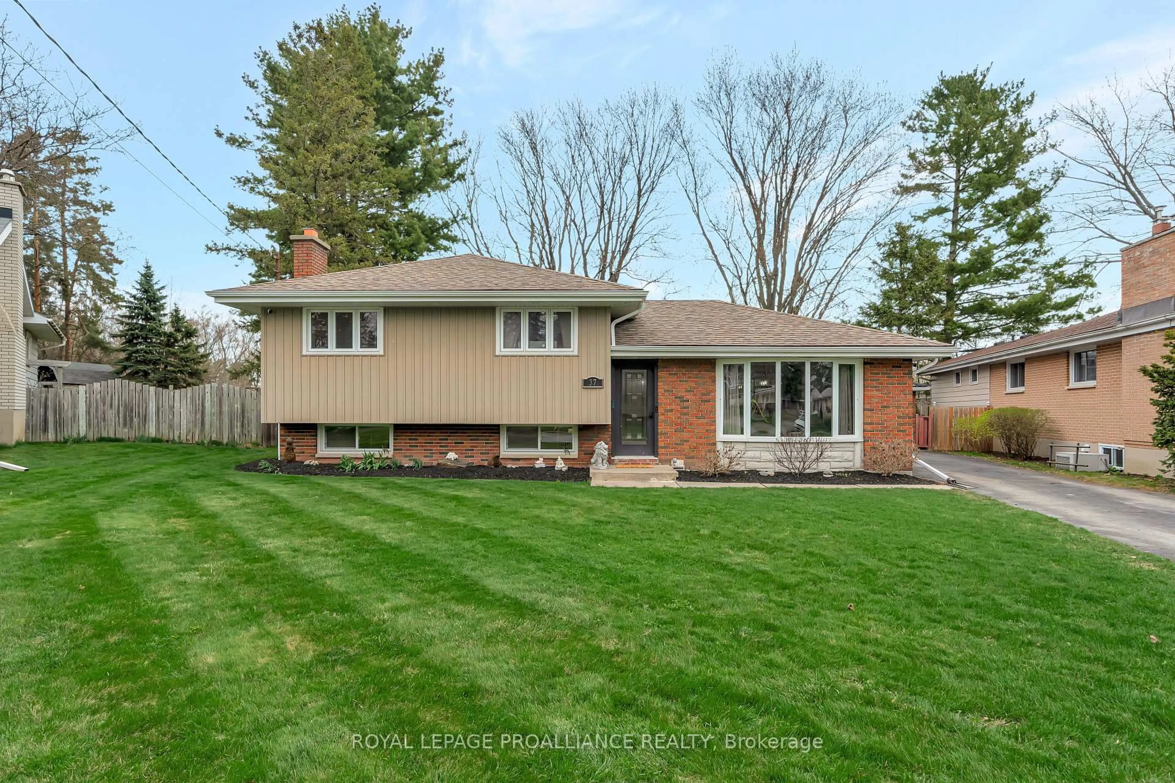 Home with brick exterior material, street for 37 Applewood Dr, Belleville Ontario K8P 4E3