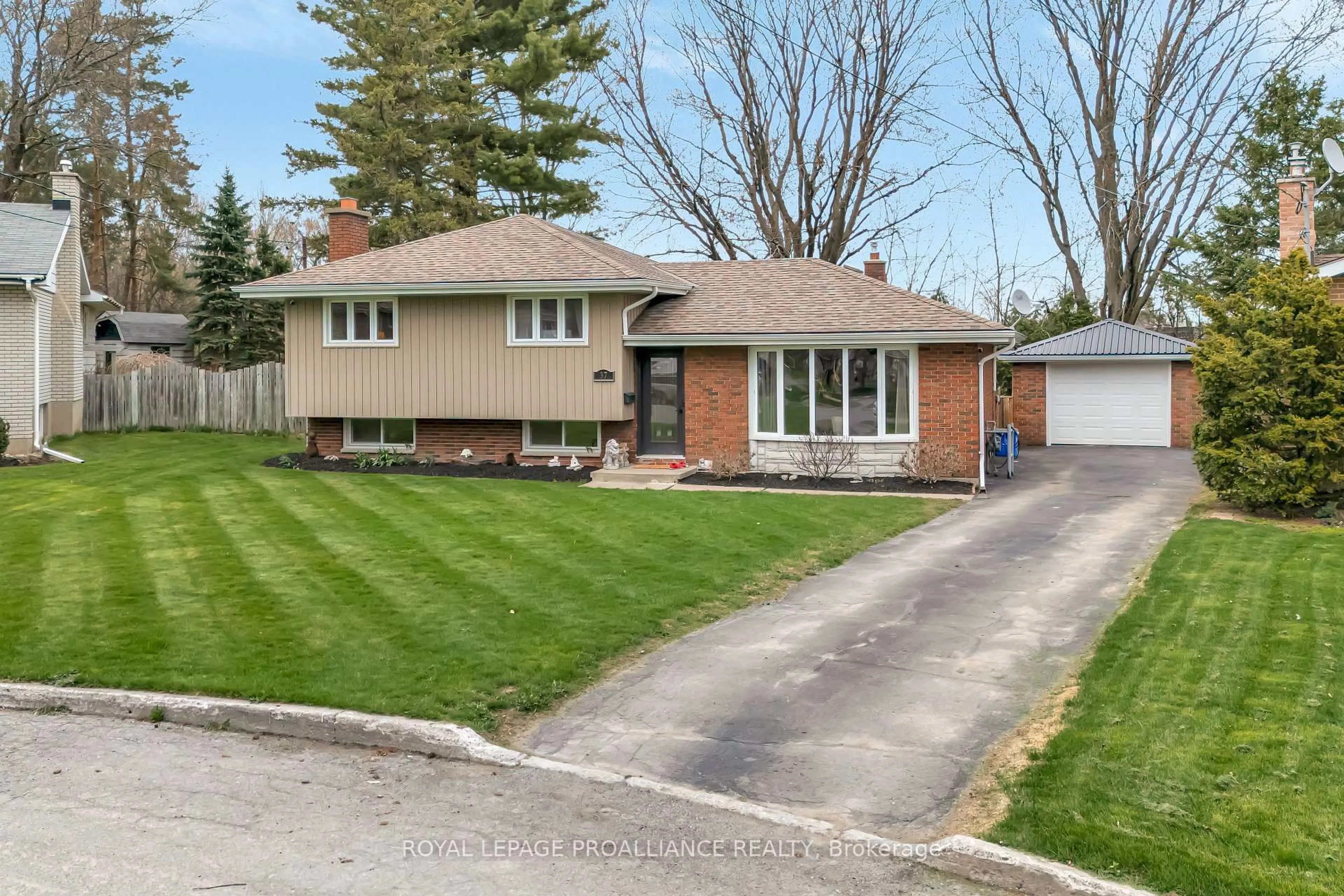 Home with brick exterior material, street for 37 Applewood Dr, Belleville Ontario K8P 4E3