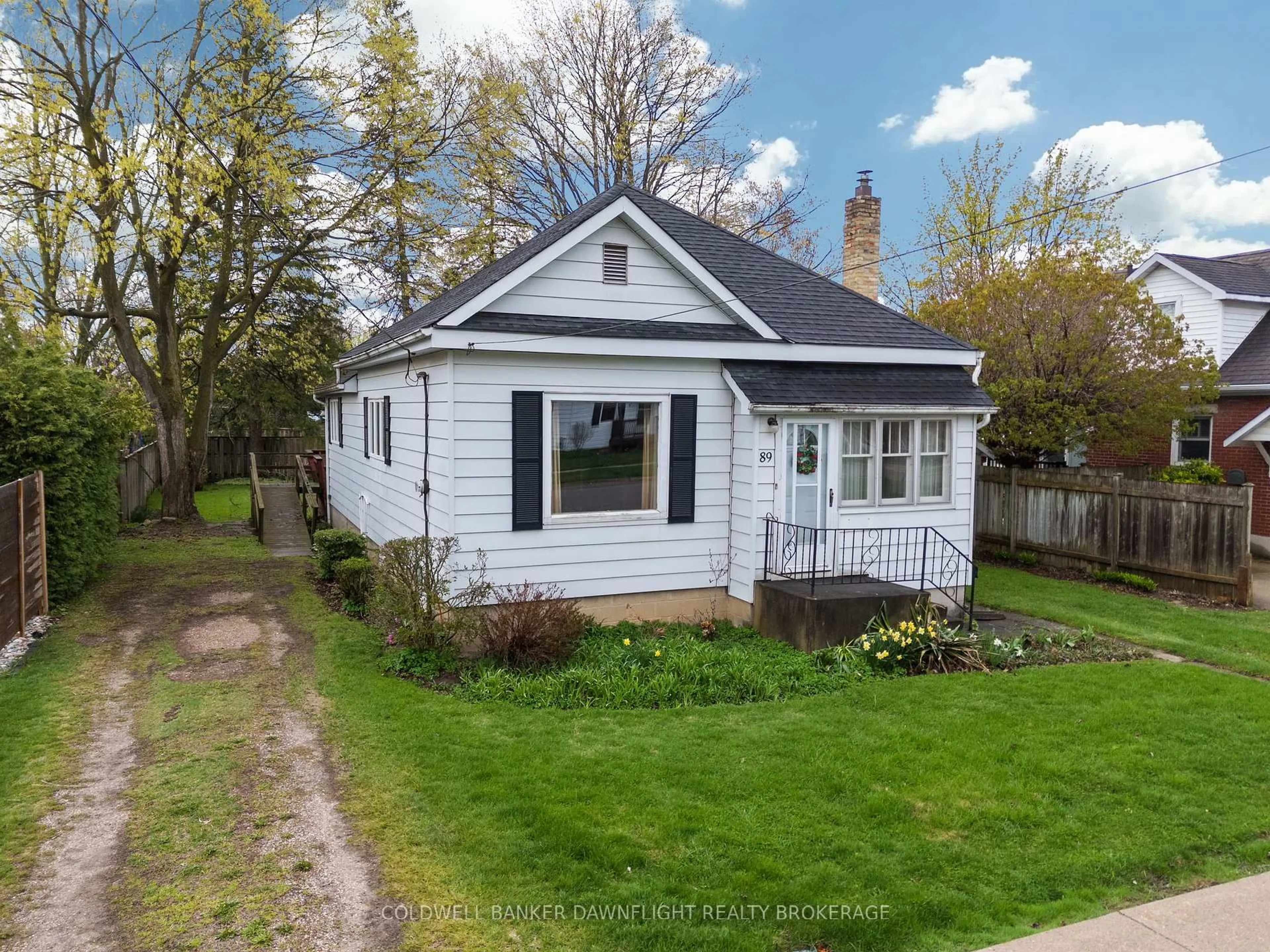 A pic from outside/outdoor area/front of a property/back of a property/a pic from drone, street for 89 John St, South Huron Ontario N0M 1S2