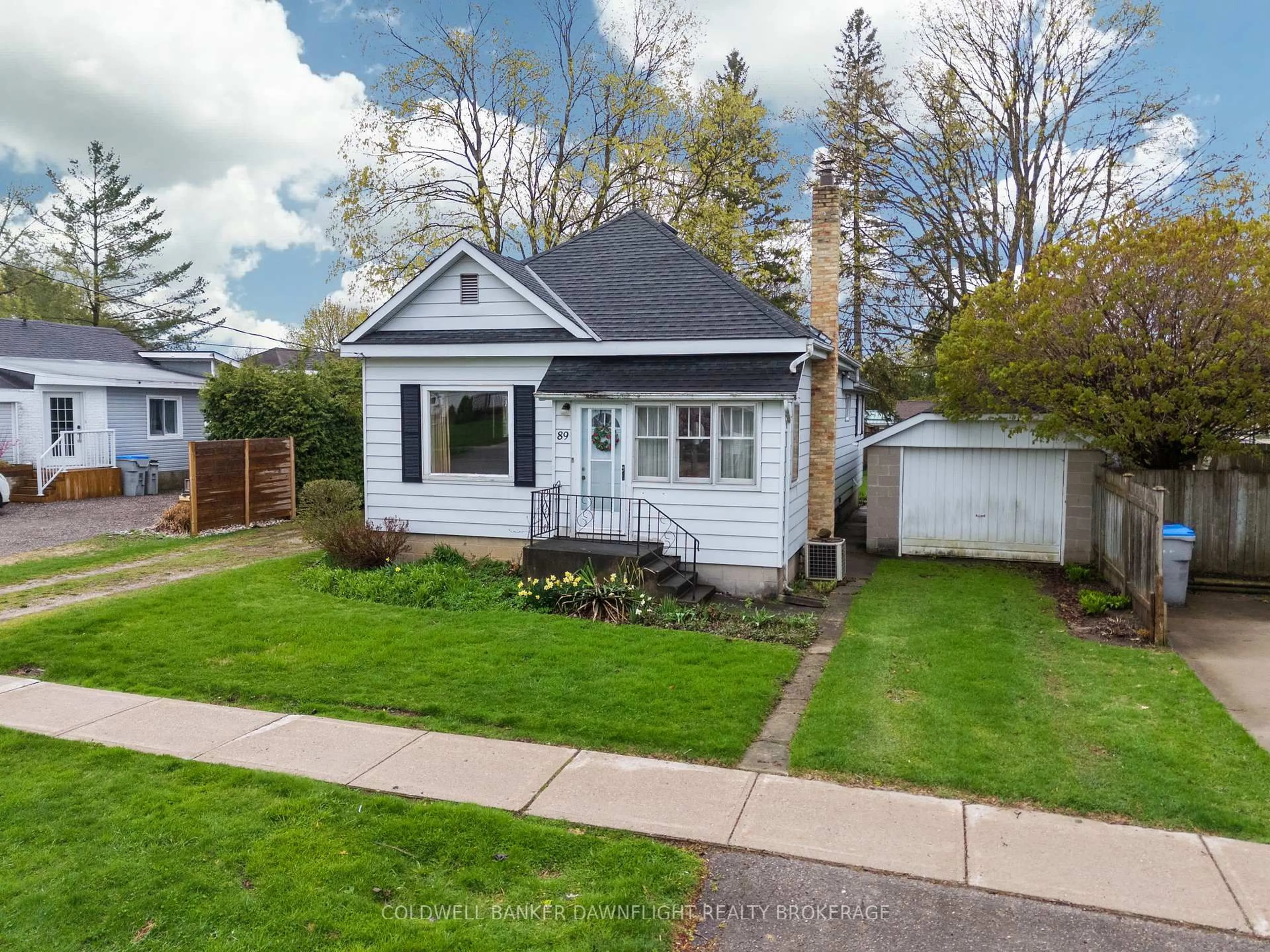 A pic from outside/outdoor area/front of a property/back of a property/a pic from drone, street for 89 John St, South Huron Ontario N0M 1S2