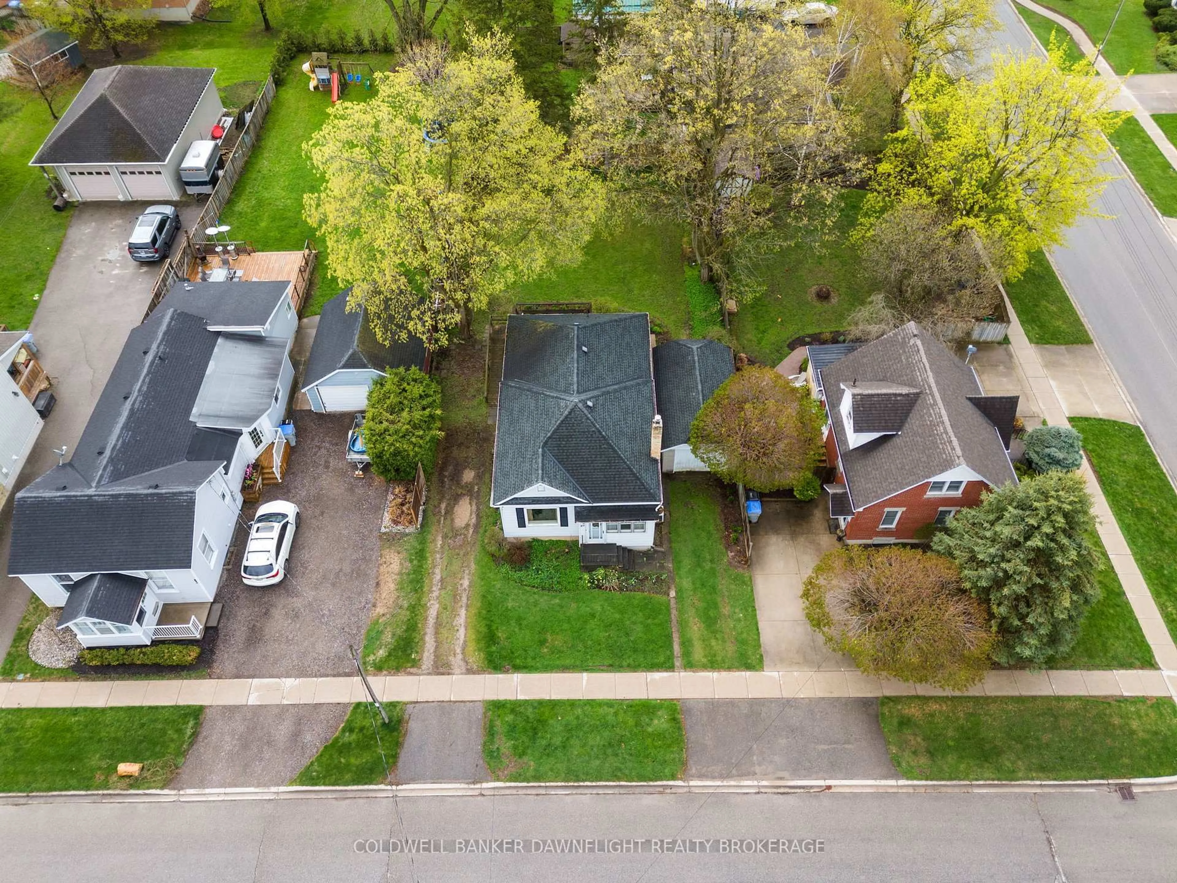 A pic from outside/outdoor area/front of a property/back of a property/a pic from drone, street for 89 John St, South Huron Ontario N0M 1S2