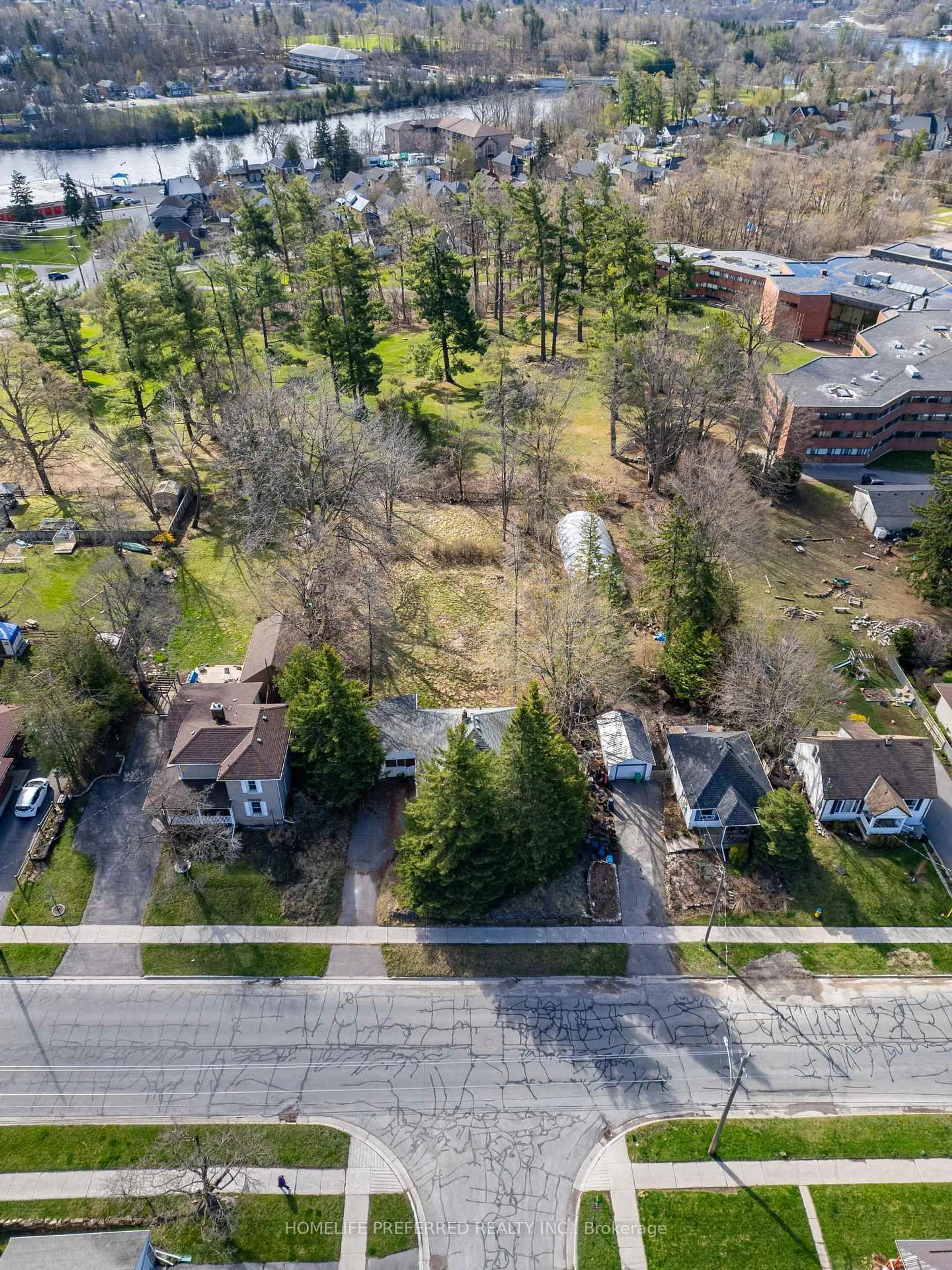 A pic from outside/outdoor area/front of a property/back of a property/a pic from drone, street for 119 Dumble Ave, Peterborough North Ontario K9H 5A9