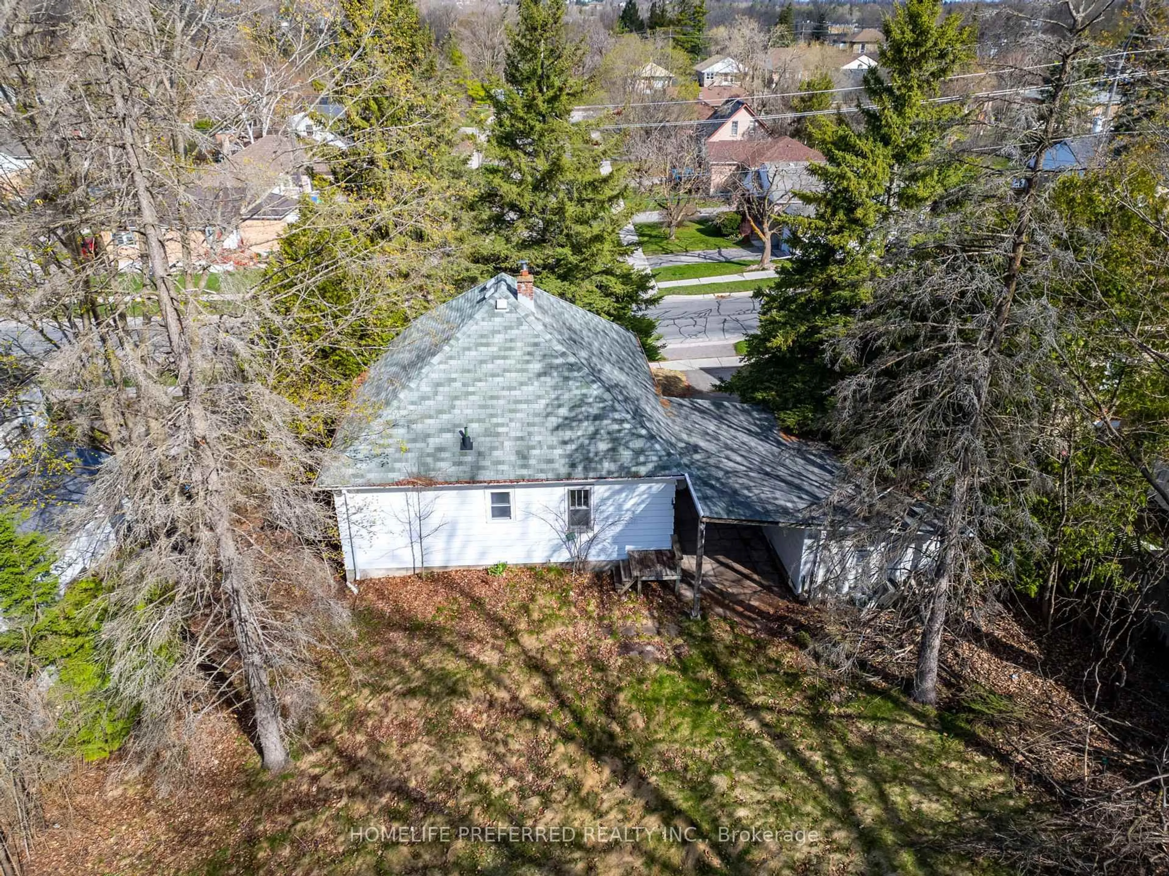 A pic from outside/outdoor area/front of a property/back of a property/a pic from drone, unknown for 119 Dumble Ave, Peterborough North Ontario K9H 5A9