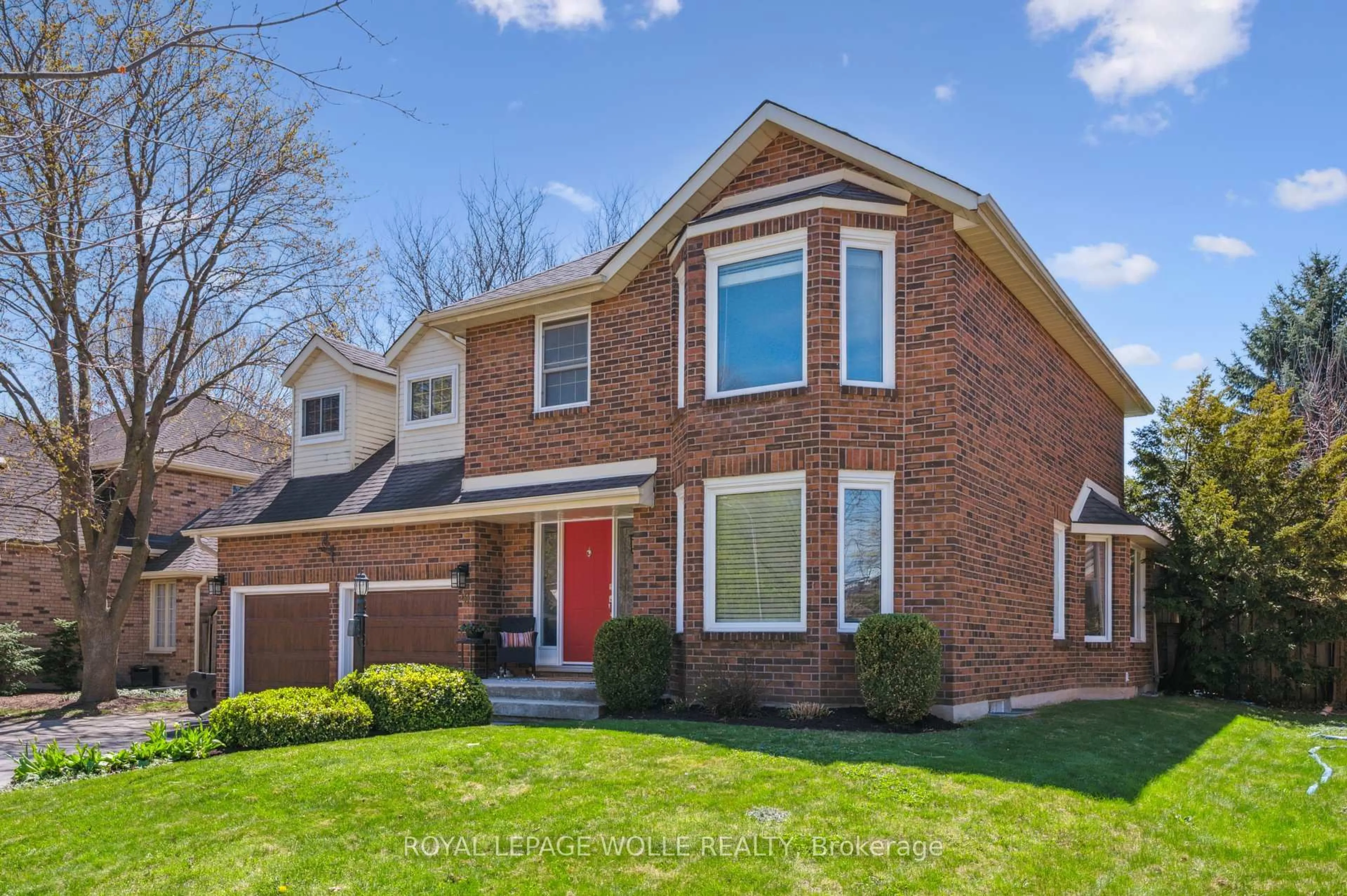 Home with brick exterior material, street for 591 Deer Run Dr, Waterloo Ontario N2K 3H7