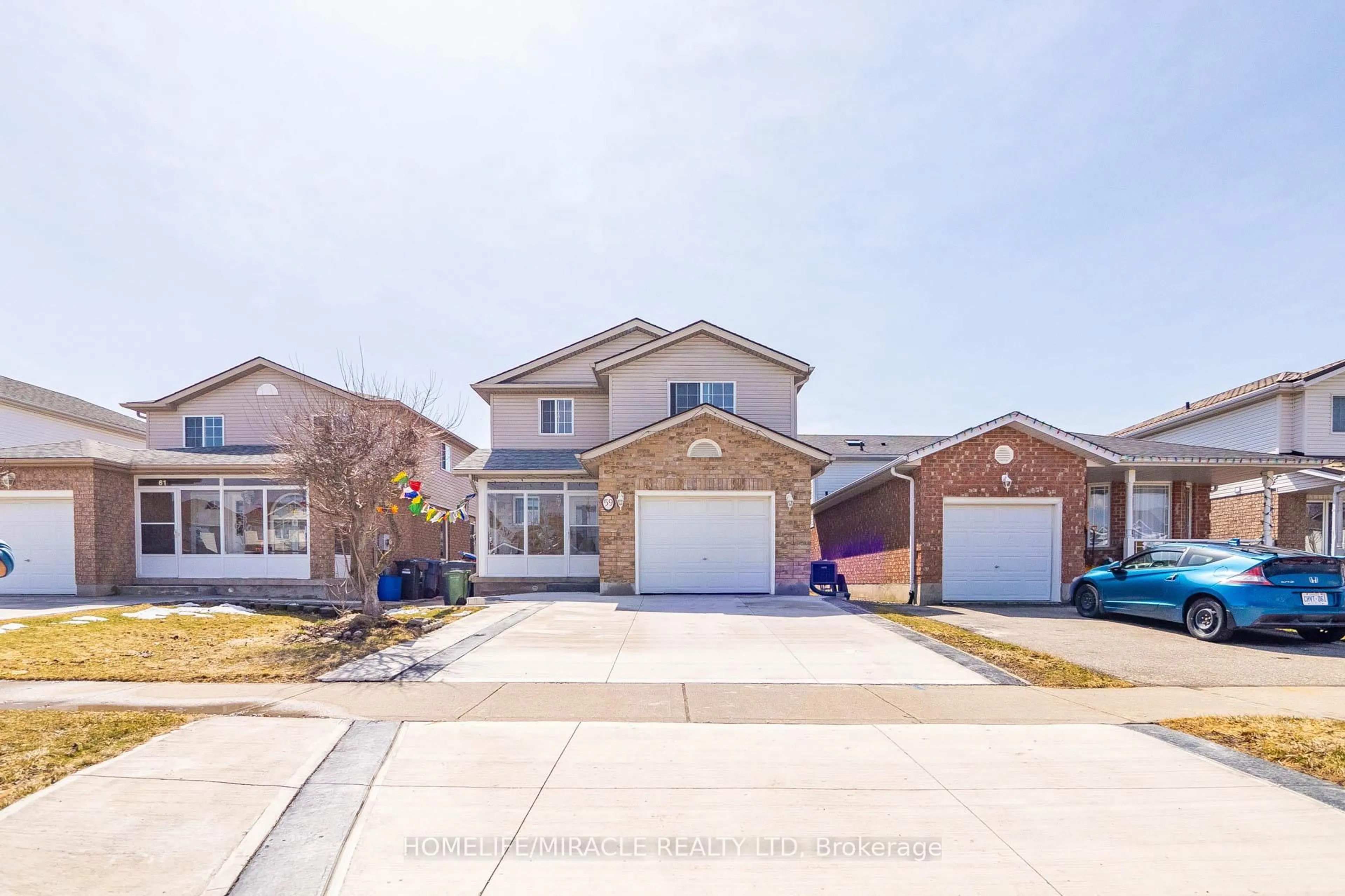 Home with brick exterior material, street for 59 Deerpath Dr, Guelph Ontario N1K 1V1
