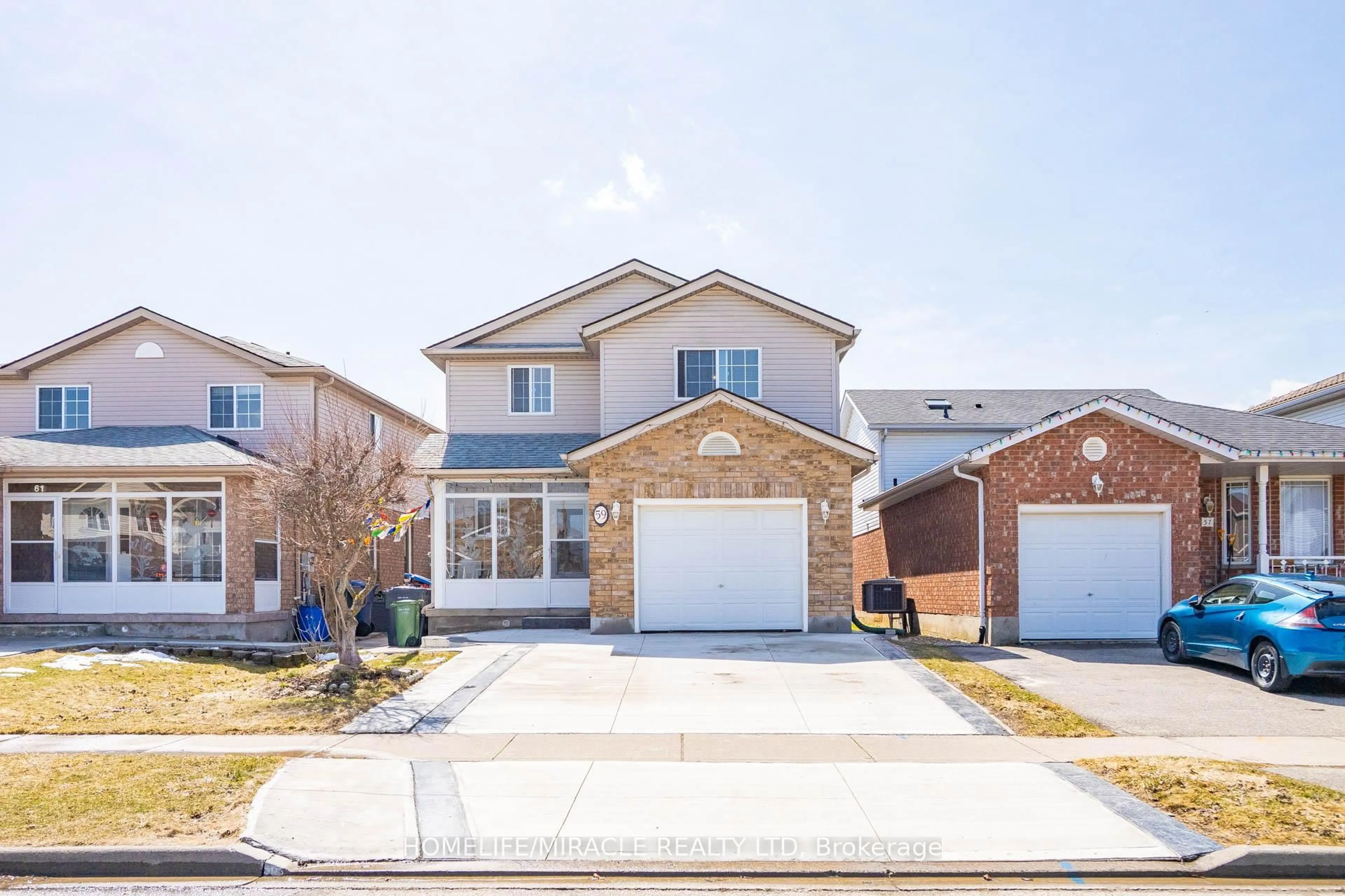 Home with brick exterior material, street for 59 Deerpath Dr, Guelph Ontario N1K 1V1