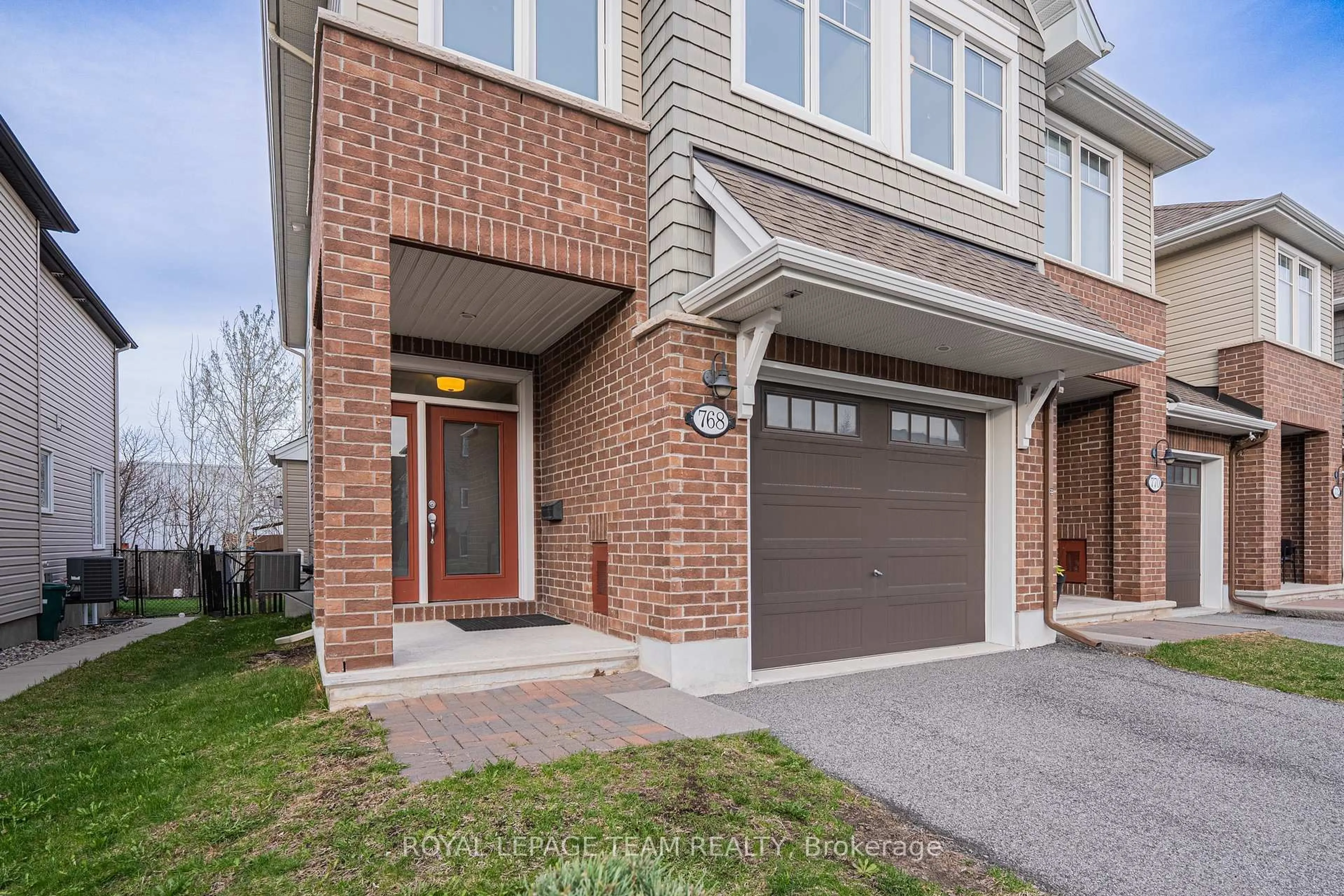 Home with brick exterior material, street for 768 CEDAR CREEK Dr, Gloucester Ontario K1T 0B2