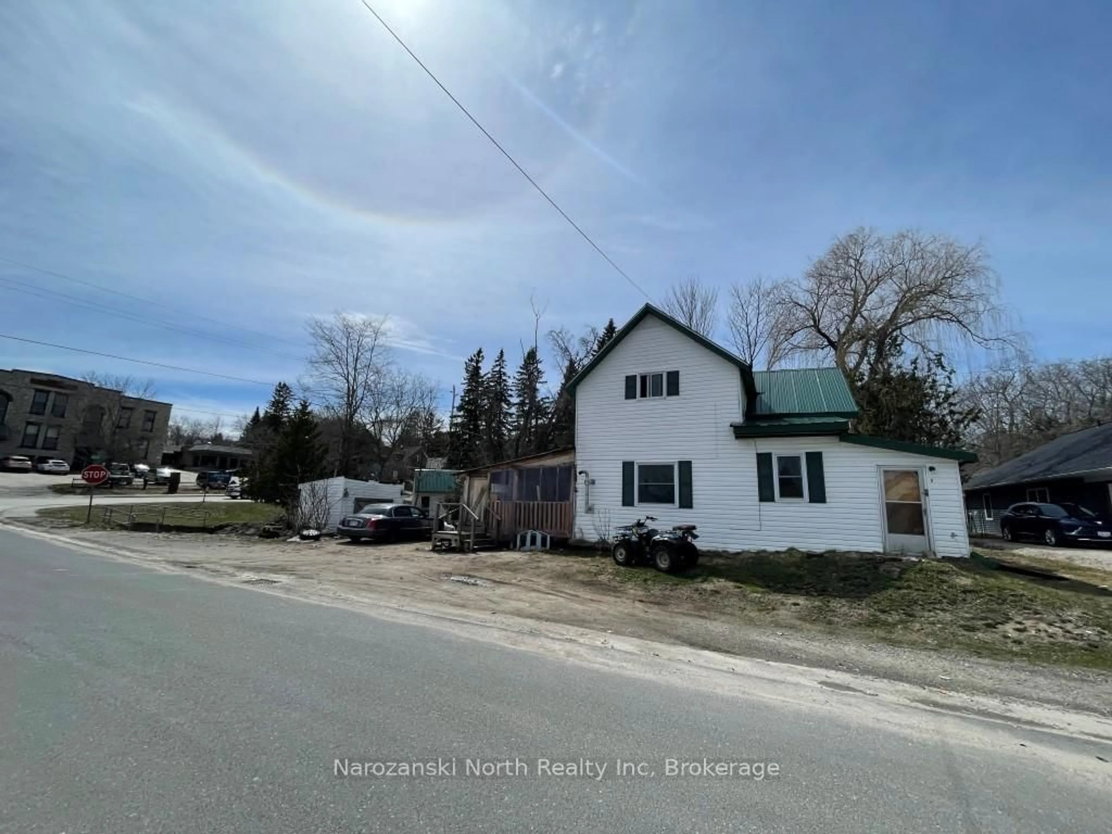 A pic from outside/outdoor area/front of a property/back of a property/a pic from drone, unknown for 1 Phipps St, Gore Bay Ontario P0P 1H0