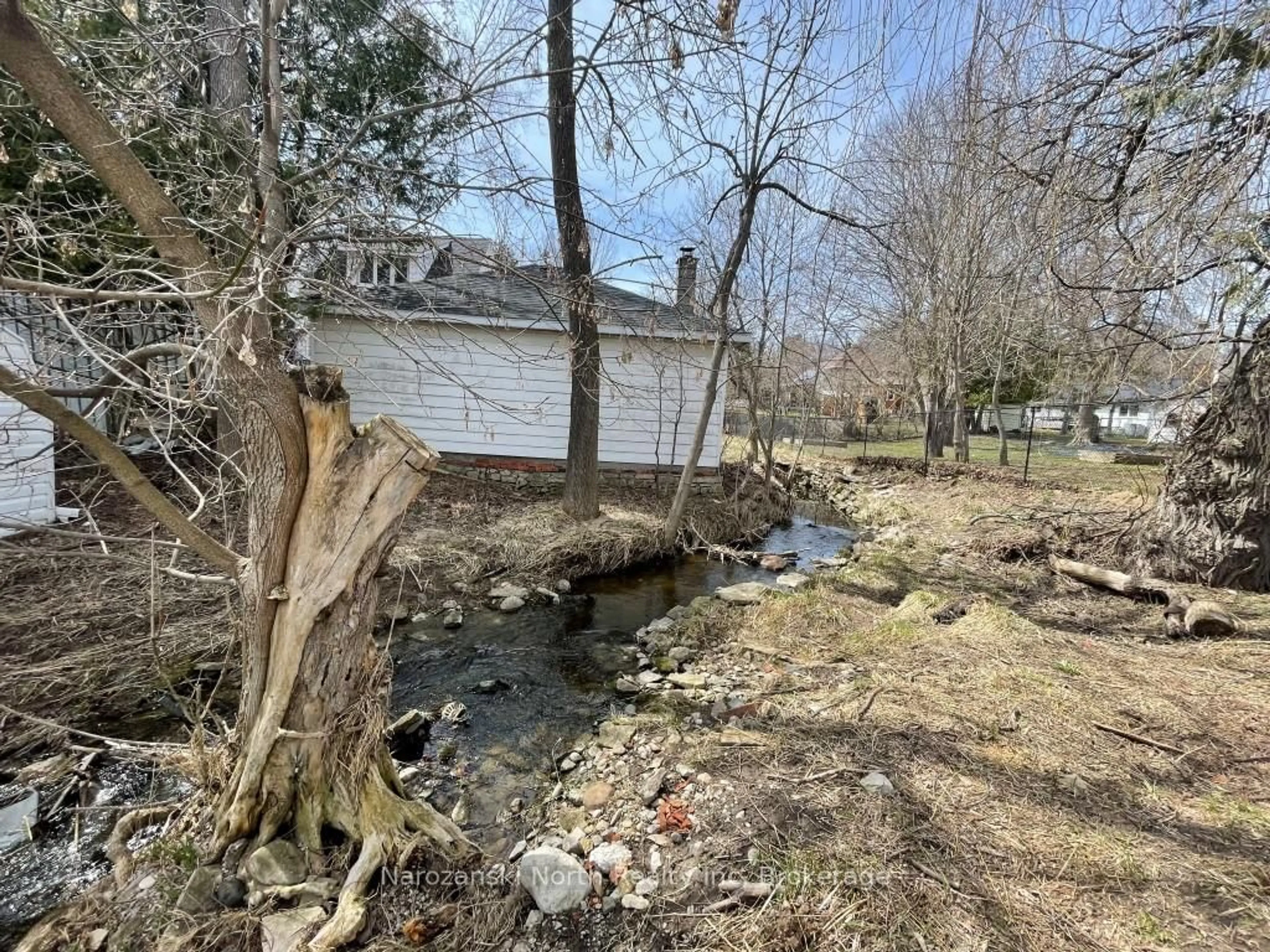 A pic from outside/outdoor area/front of a property/back of a property/a pic from drone, water/lake/river/ocean view for 1 Phipps St, Gore Bay Ontario P0P 1H0
