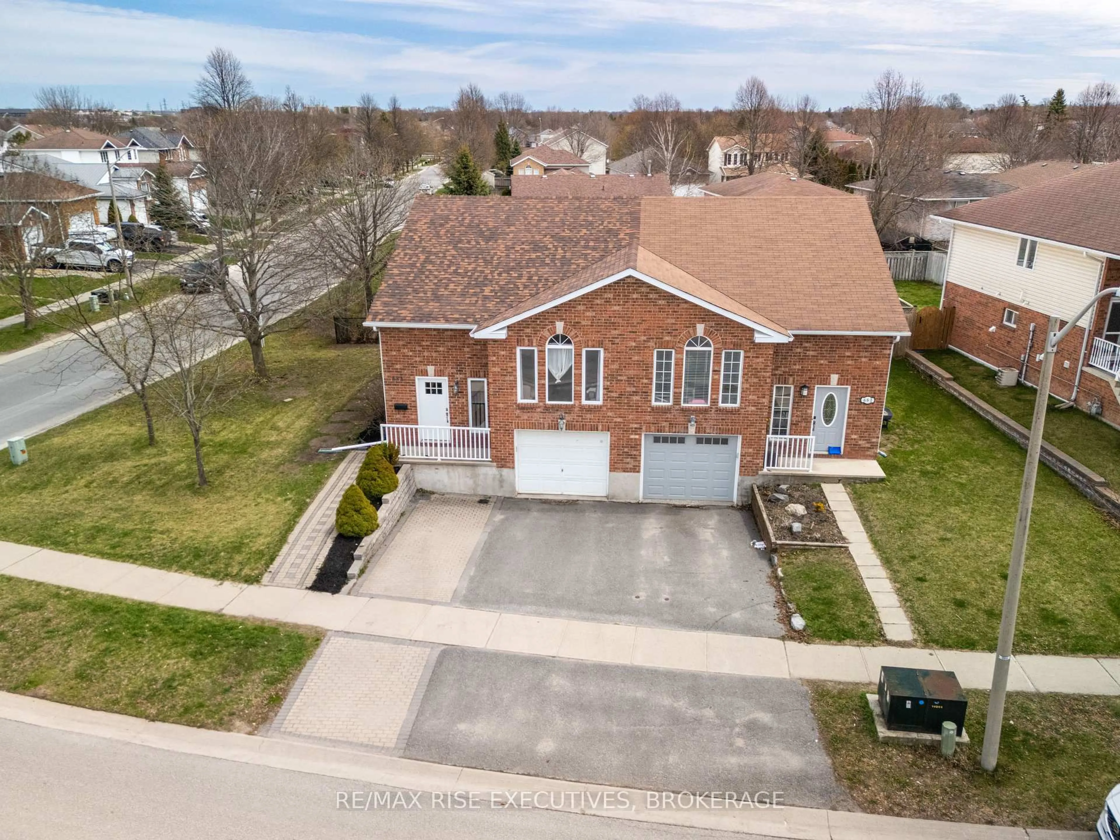 A pic from outside/outdoor area/front of a property/back of a property/a pic from drone, street for 663 Barnsley Cres, Kingston Ontario K7M 8X4
